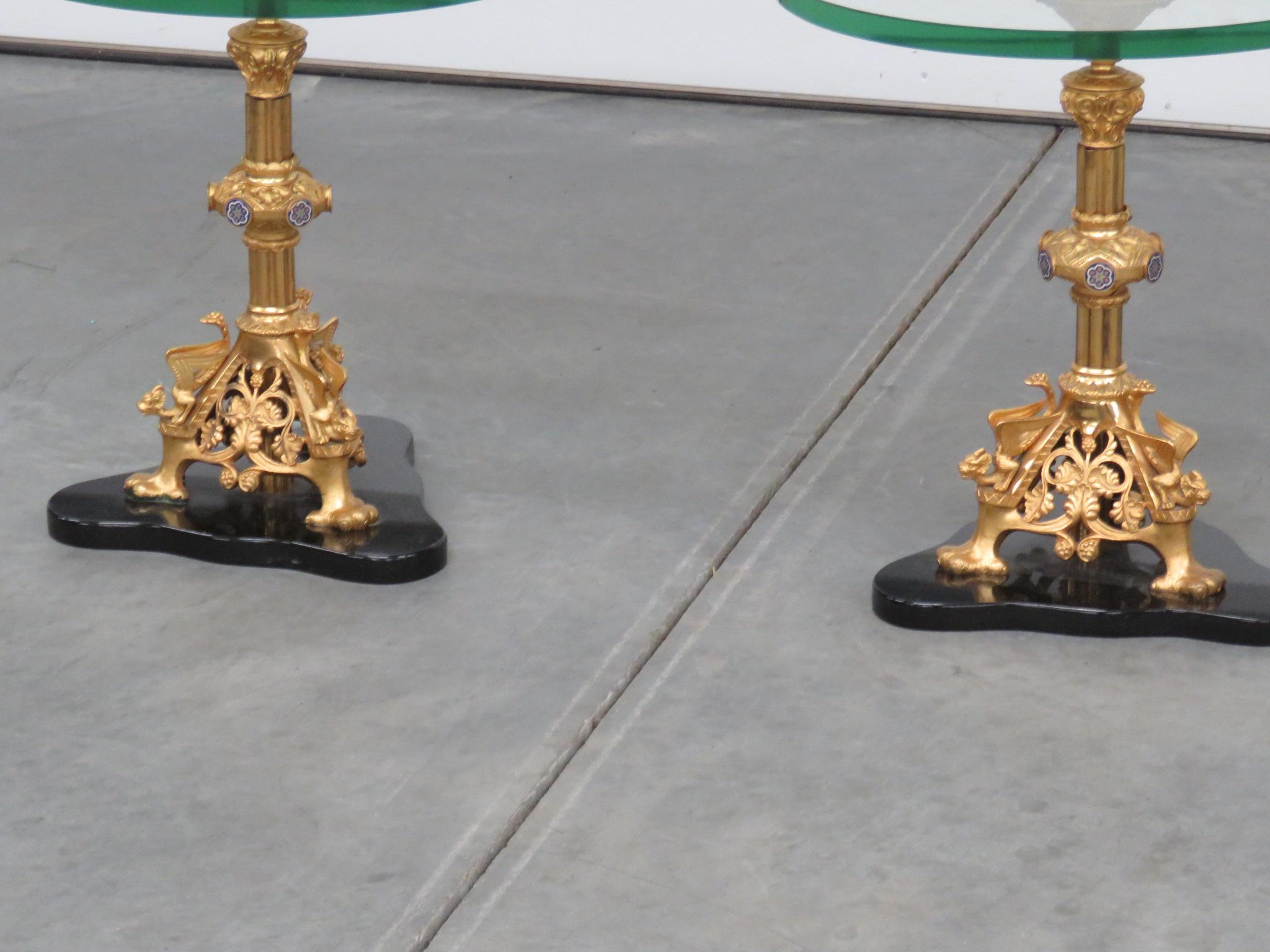 Pair of Regency style glass top end tables with marble bases, brass supports, and 3/4