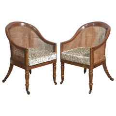 Paire de fauteuils baignoire en acajou tressé de style Régence