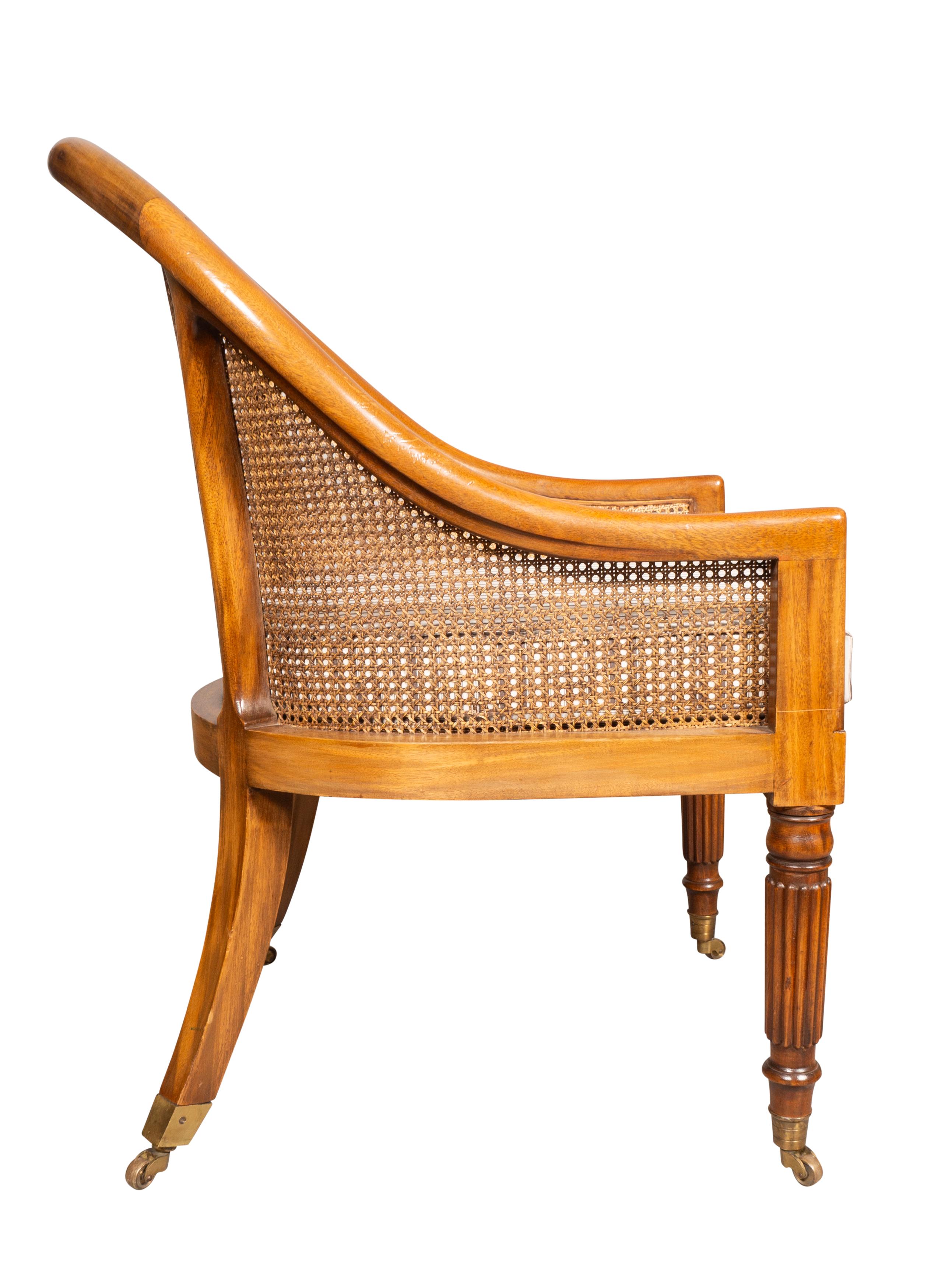 Mid-20th Century Pair Of Regency Style Mahogany Caned Tub Chairs