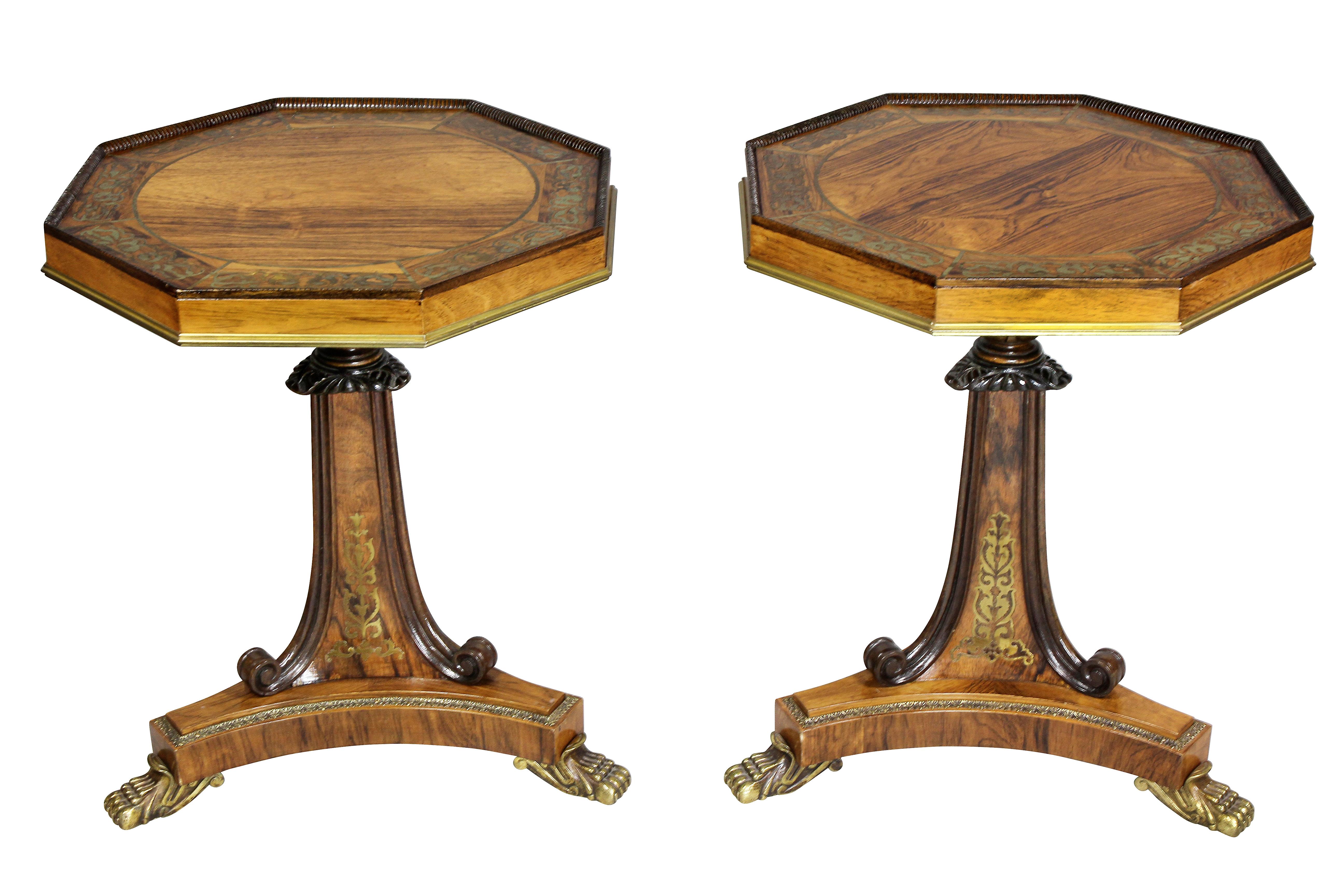 Each with octagonal tops with beaded edges, brass inlaid on a shaped triangular support ending on a brass-mounted triangular base with bronze paw feet.