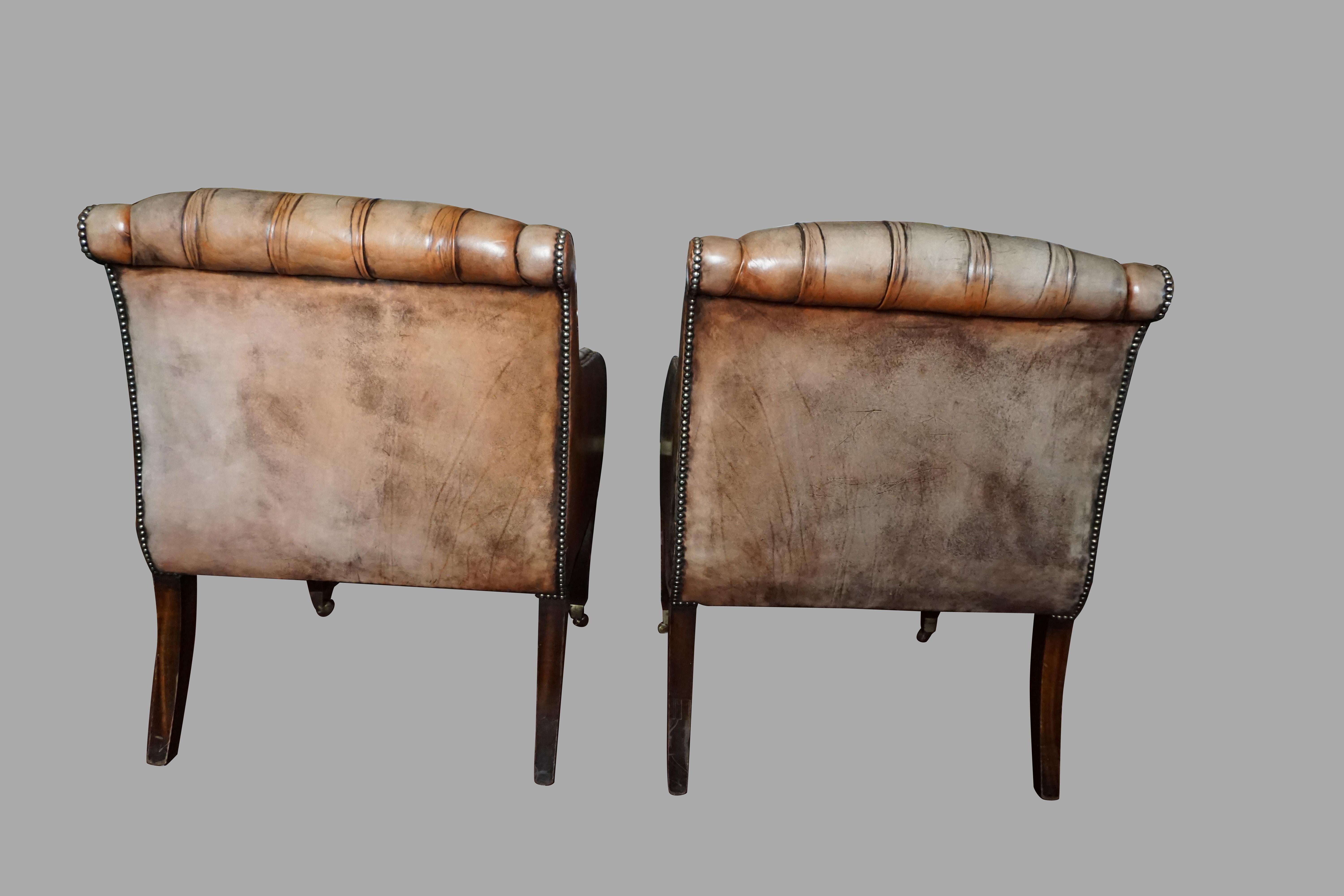 Late 20th Century Pair of Regency Style Tufted Leather Club Chairs with Mahogany Legs