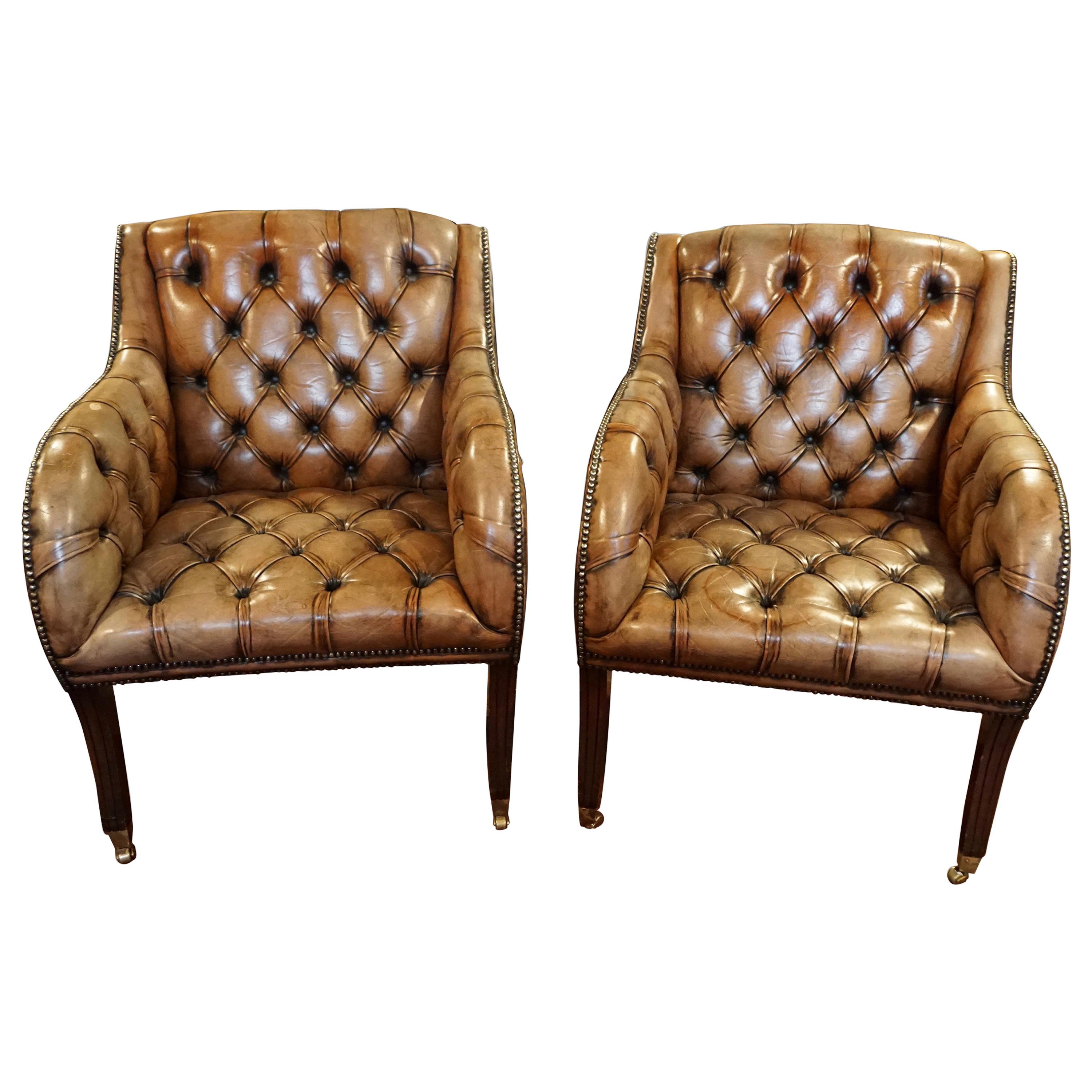 Pair of Regency Style Tufted Leather Club Chairs with Mahogany Legs