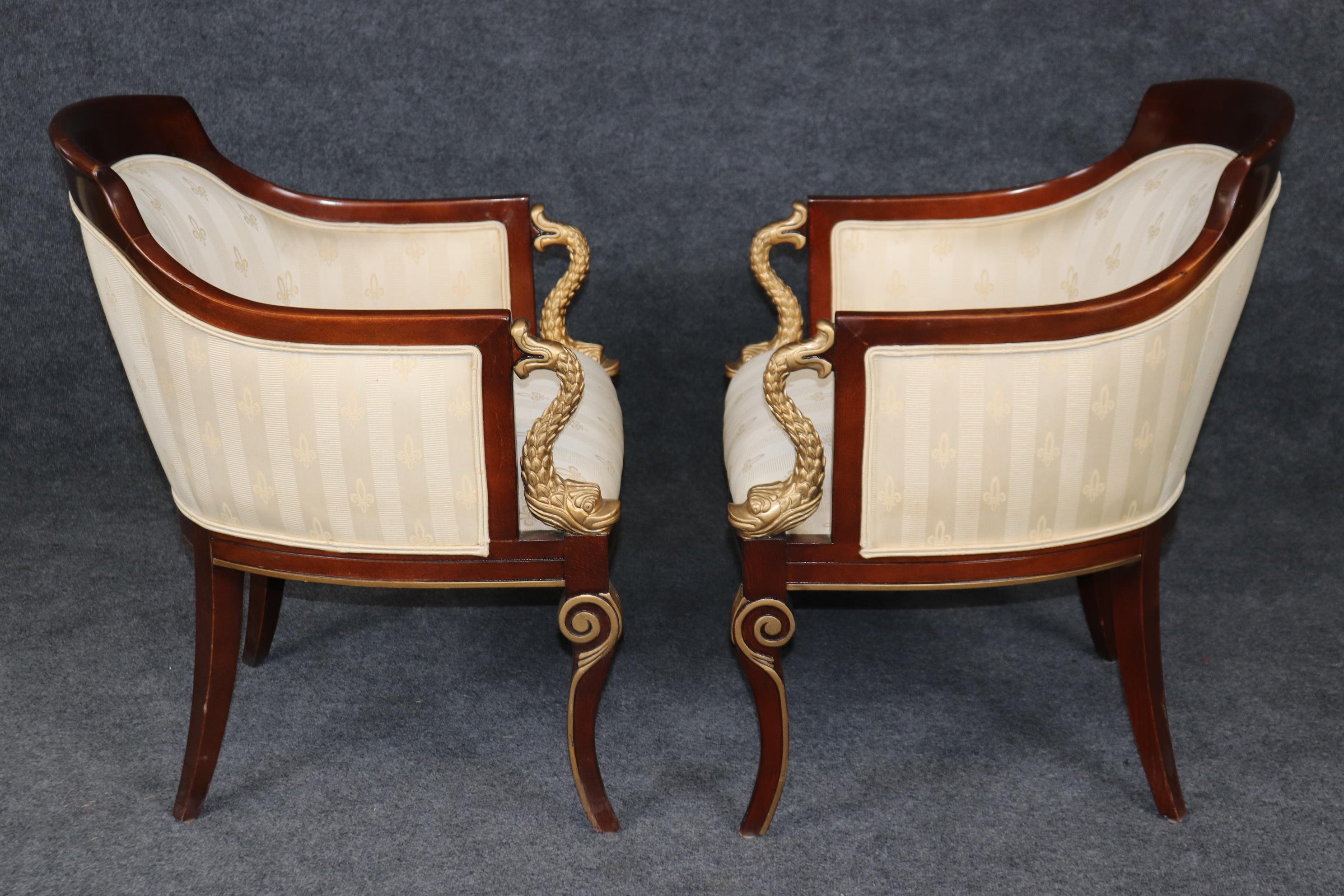 American Pair of Regency Style Upholstered Bergères Chairs By Council Gilded Dolphins