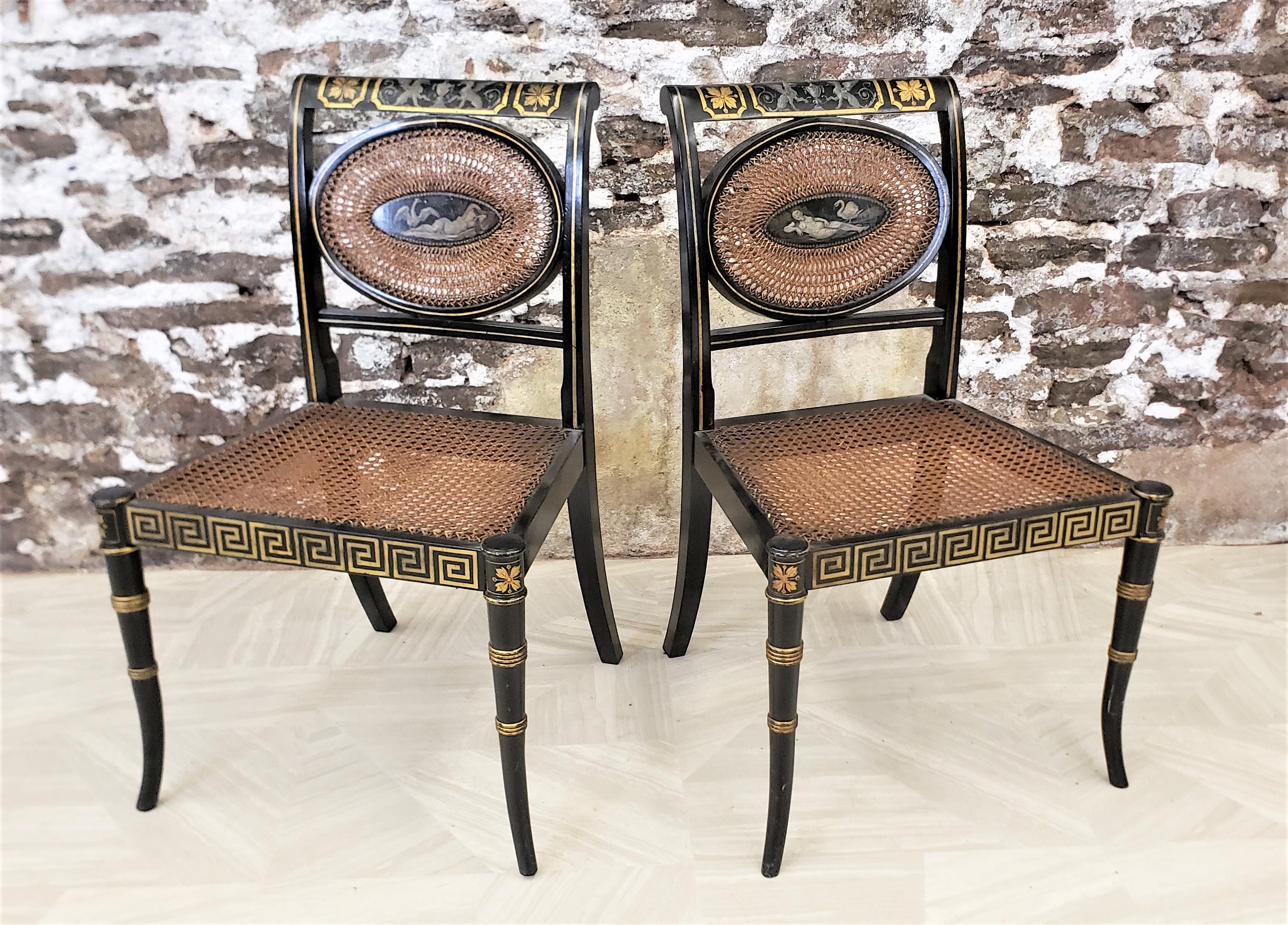 Cane Pair of Regency Styled Side or Accent Chairs with Reclining Nude & Swan Panels For Sale