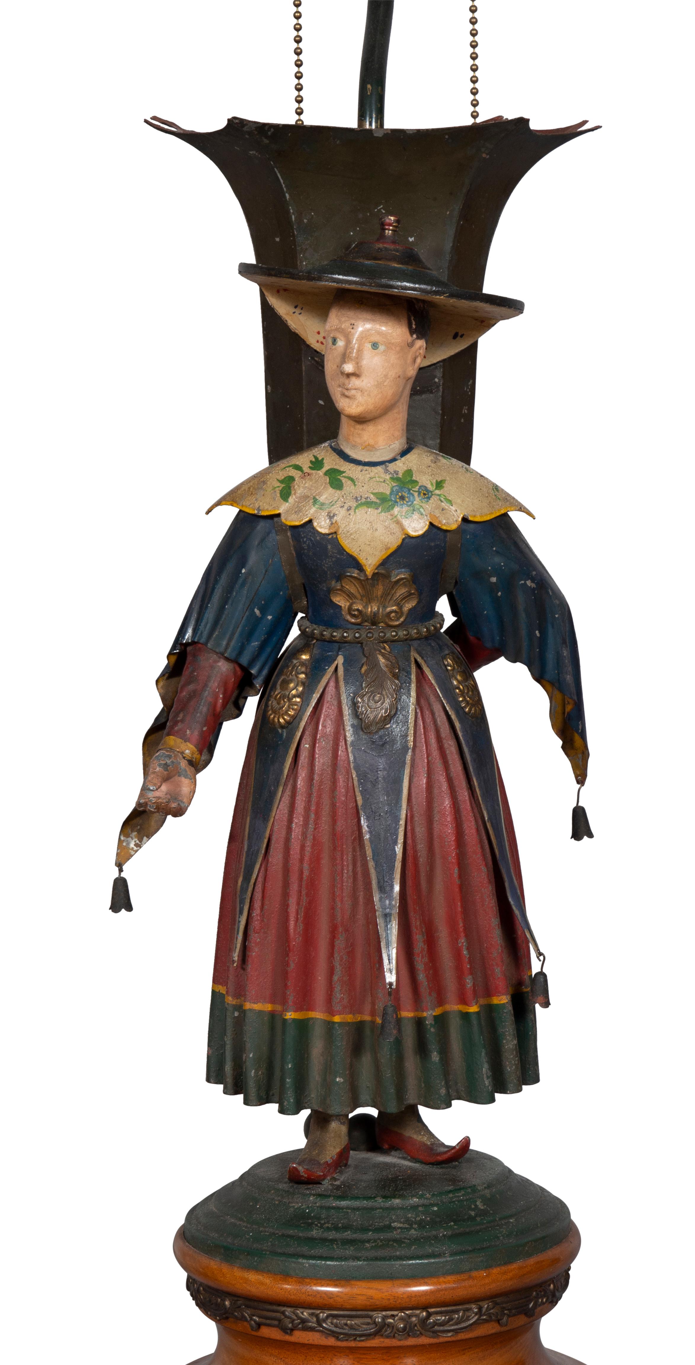 Now lamps with wood bases, each depicting an Asian figure in painted costume dress.