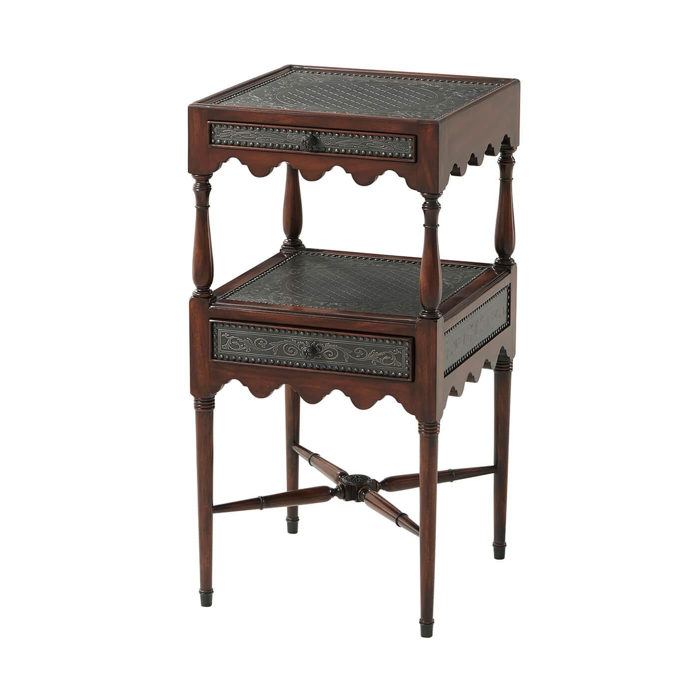 A Regency style solid two tier side table with engraved brass decoration, the top and under tier with floral frame lattice work cartouches to the panels and each fitted with a frieze drawer, between turned supports and with undulating aprons, on