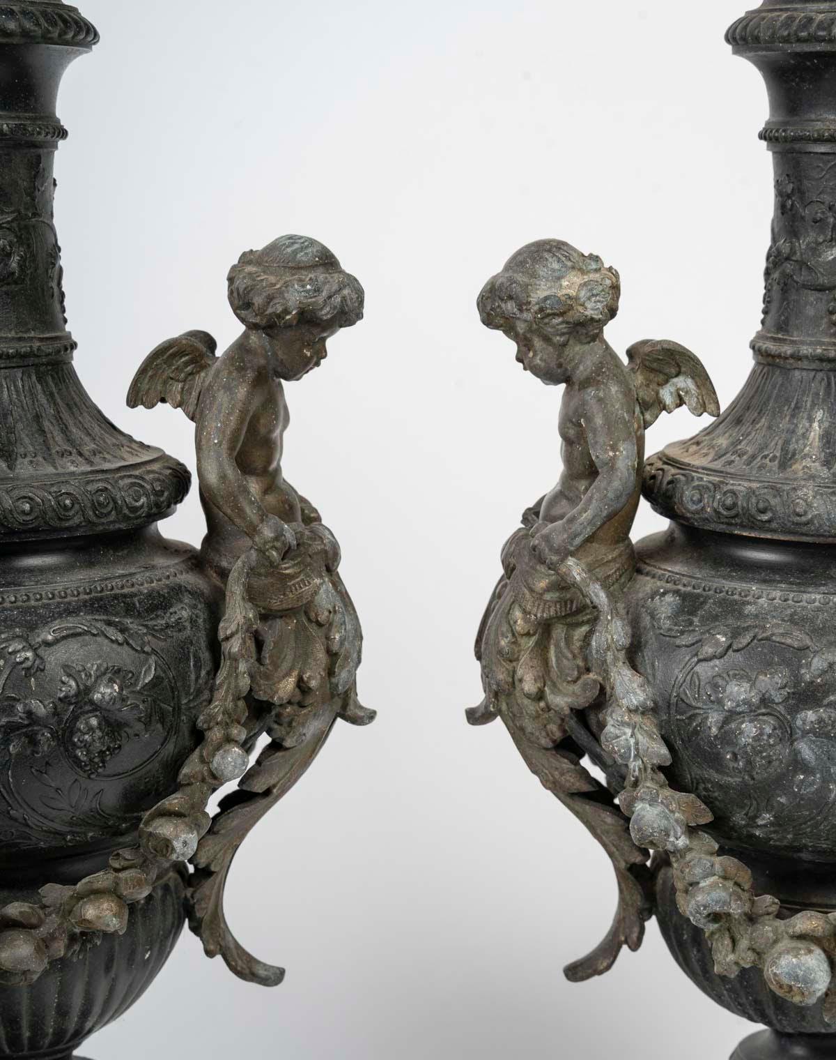 French Pair of Regule Ewers on Marble Base.
