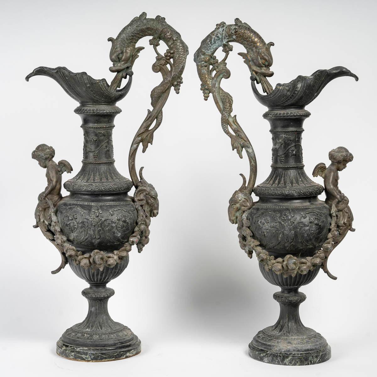 Pair of Regule Ewers on Marble Base. 1