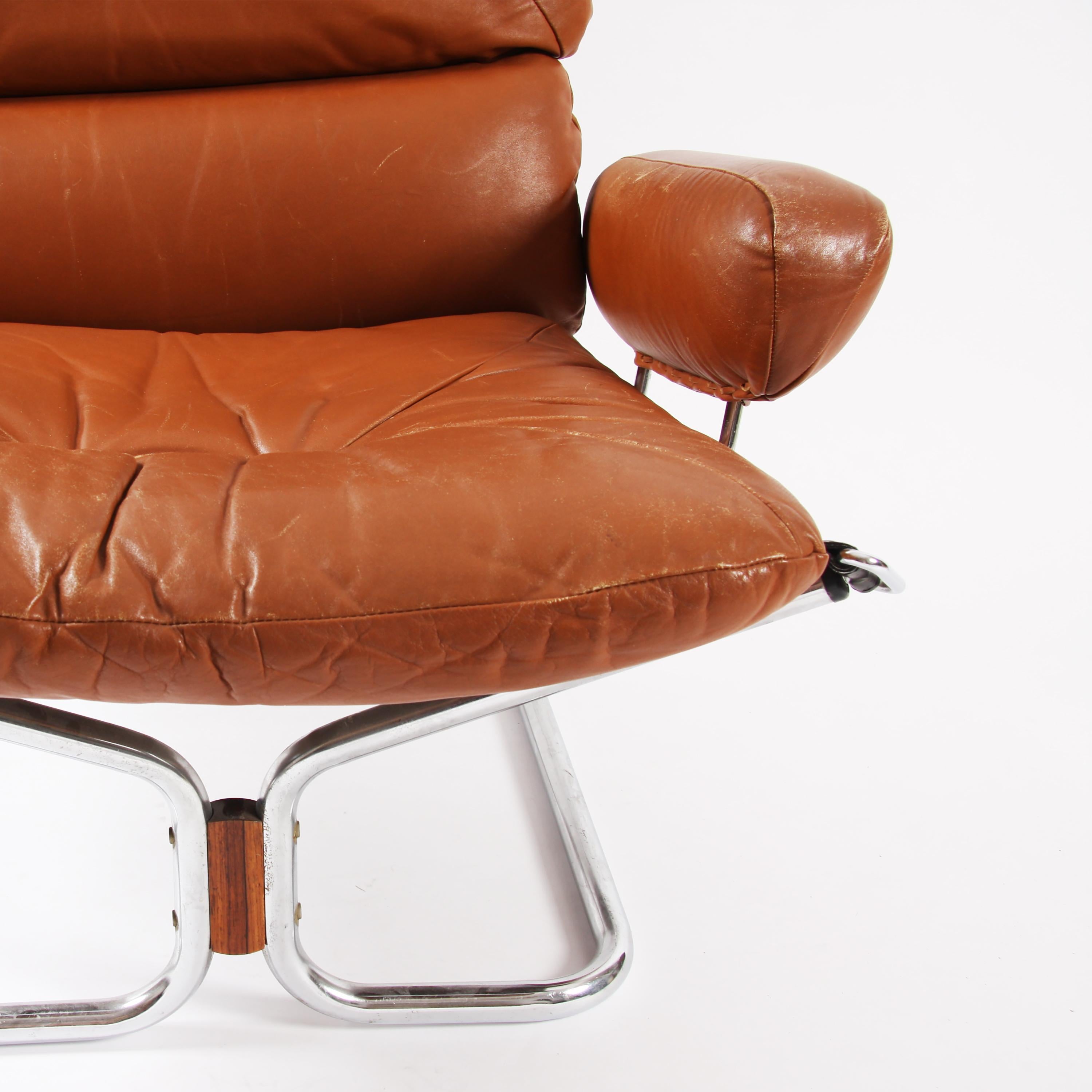 Mid-Century Modern Pair of Relling Chairs For Sale