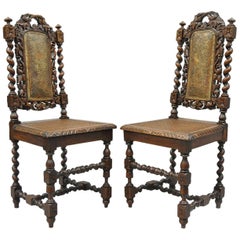 Pair of Renaissance Revival Carved Oakwood Black Forest Barley Twist Cane Chairs