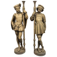 Pareja de figuras de página de hierro del Renacimiento italiano