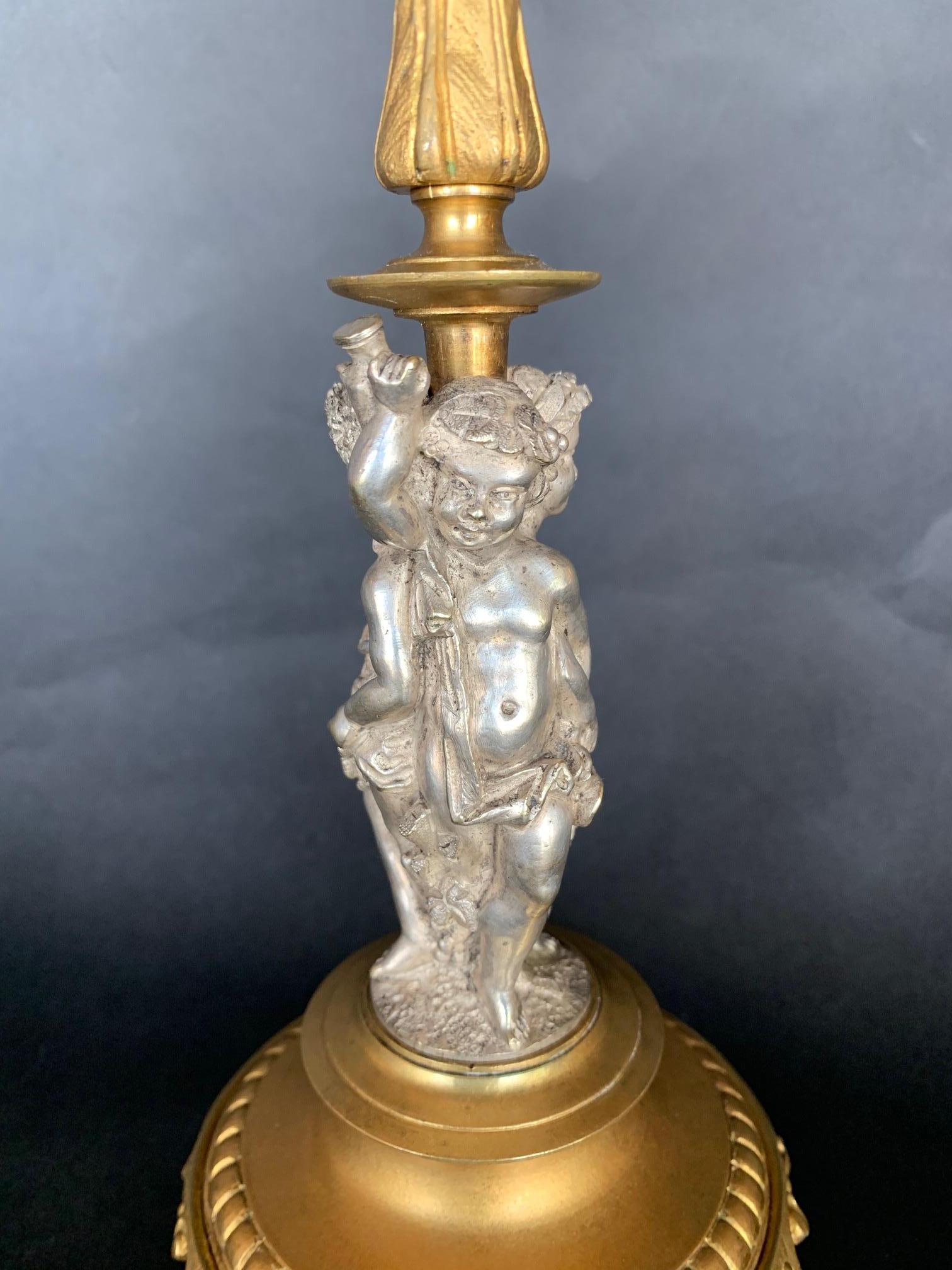 19th Century Pair of Renaissance Revival Part-Silvered Bronze Candlesticks For Sale