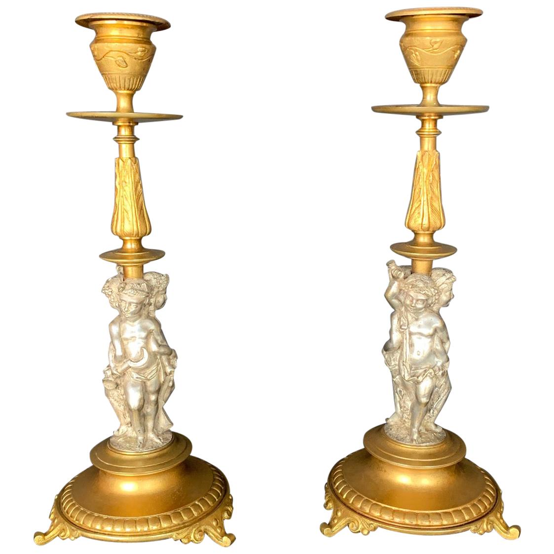 Pair of Renaissance Revival Part-Silvered Bronze Candlesticks For Sale