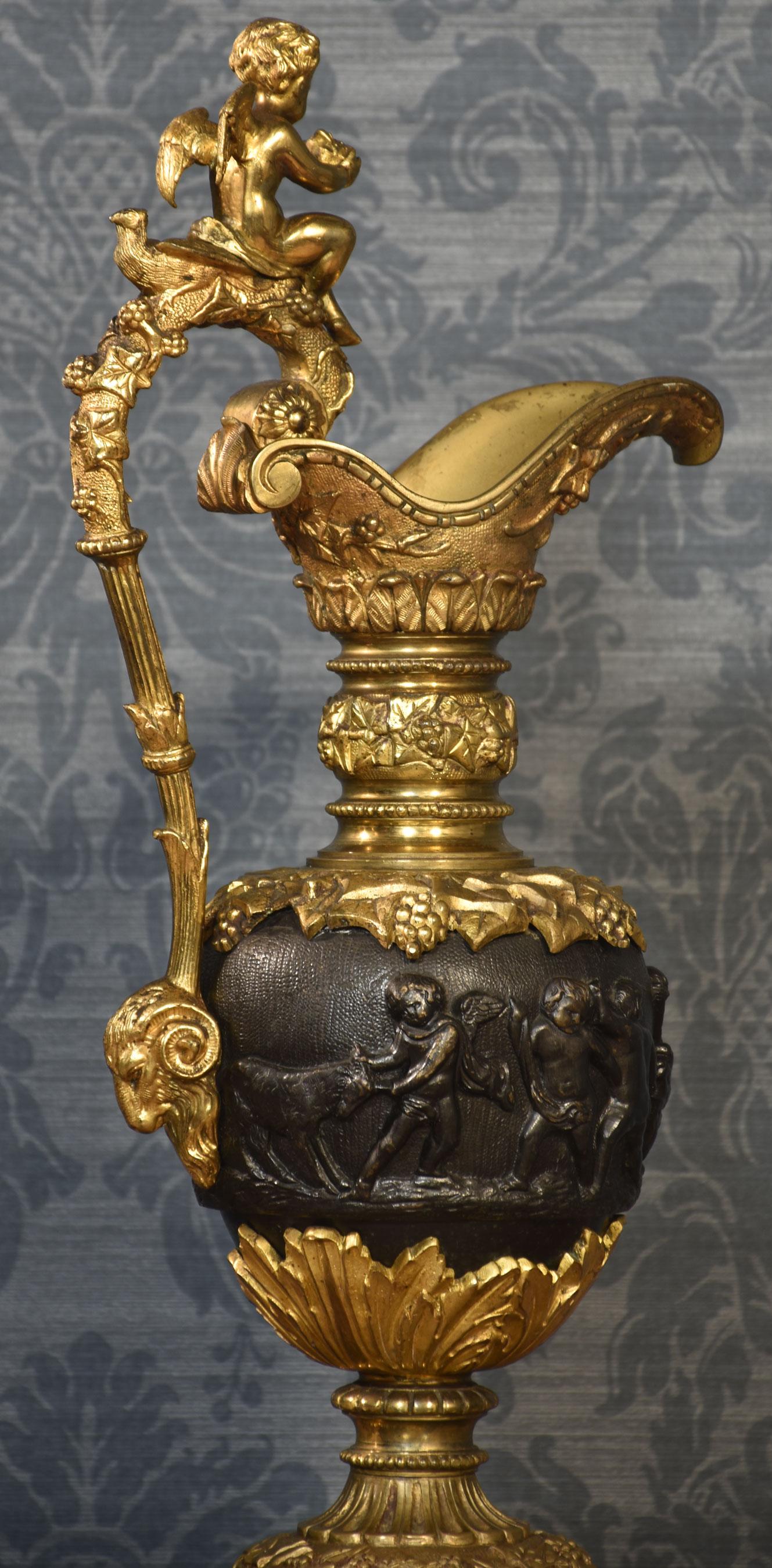 20th Century Pair of Renaissance style French patinated bronze ewers For Sale