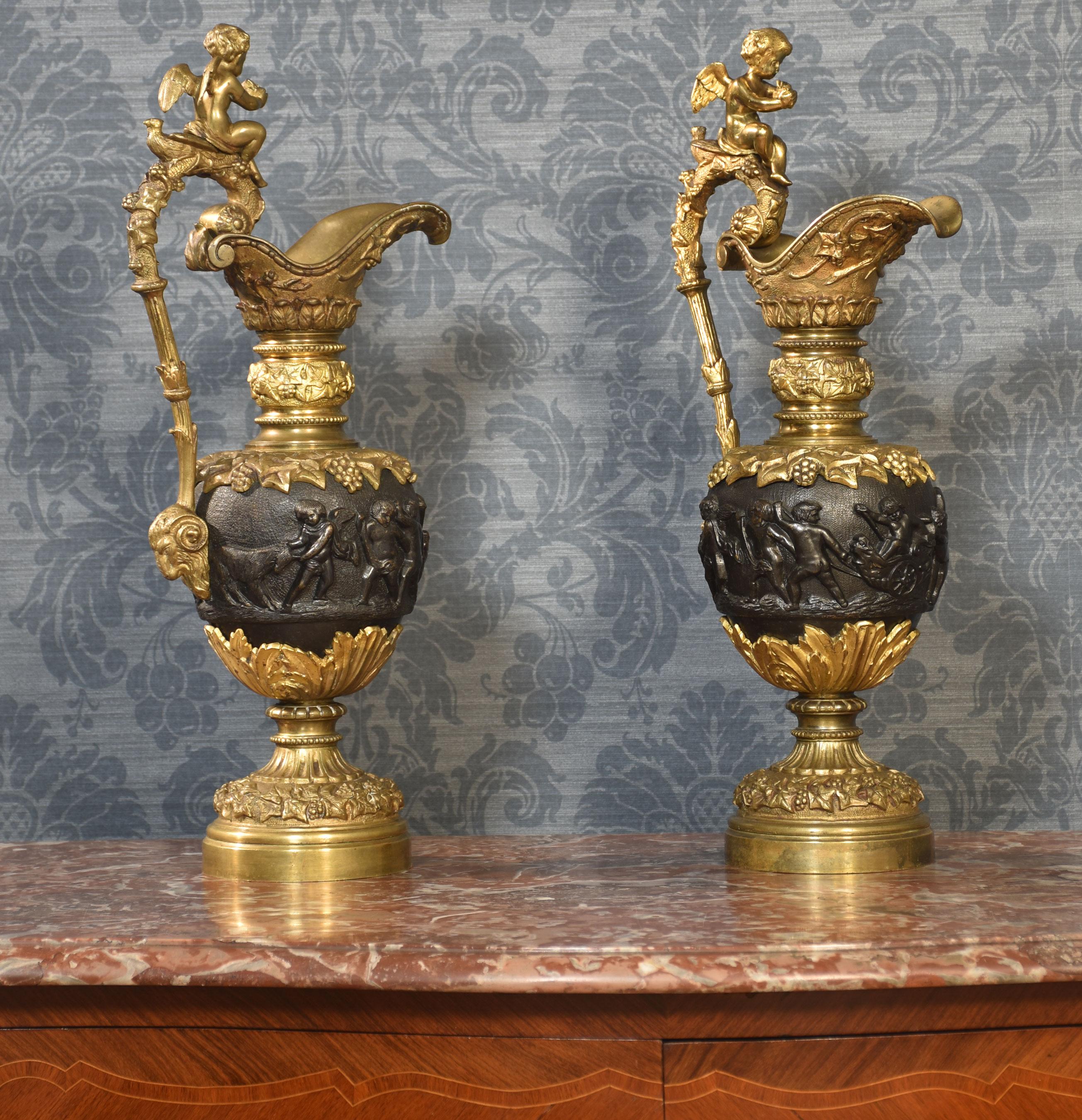 Bronze Pair of Renaissance style French patinated bronze ewers For Sale