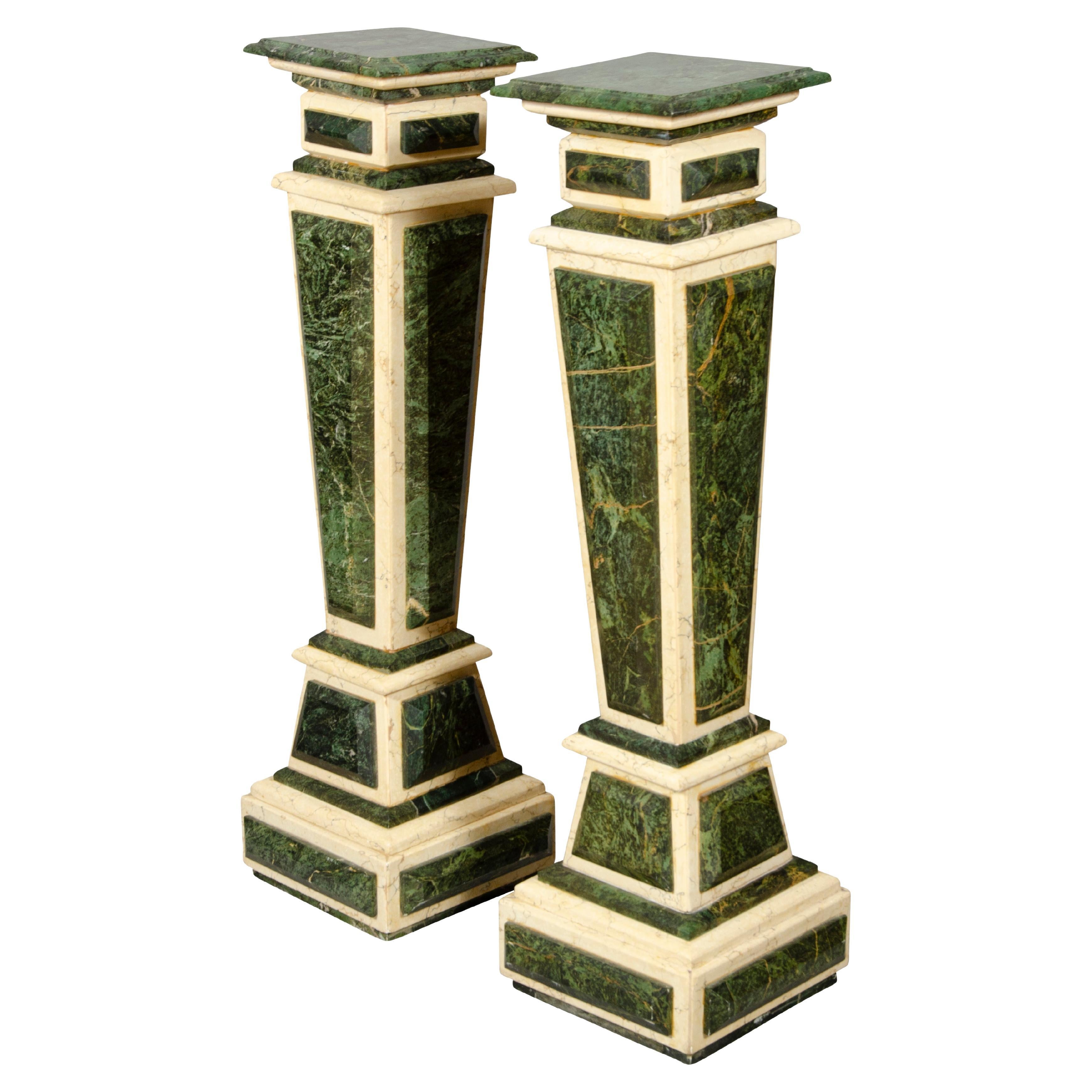 Each with green and cream colored marble. Square tops with tapered column with applied panels, plinth base.