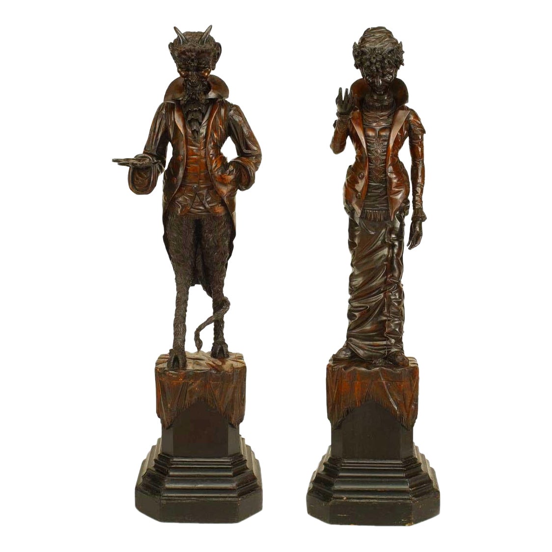 Paire de figures de diables en noyer de la Renaissance en vente