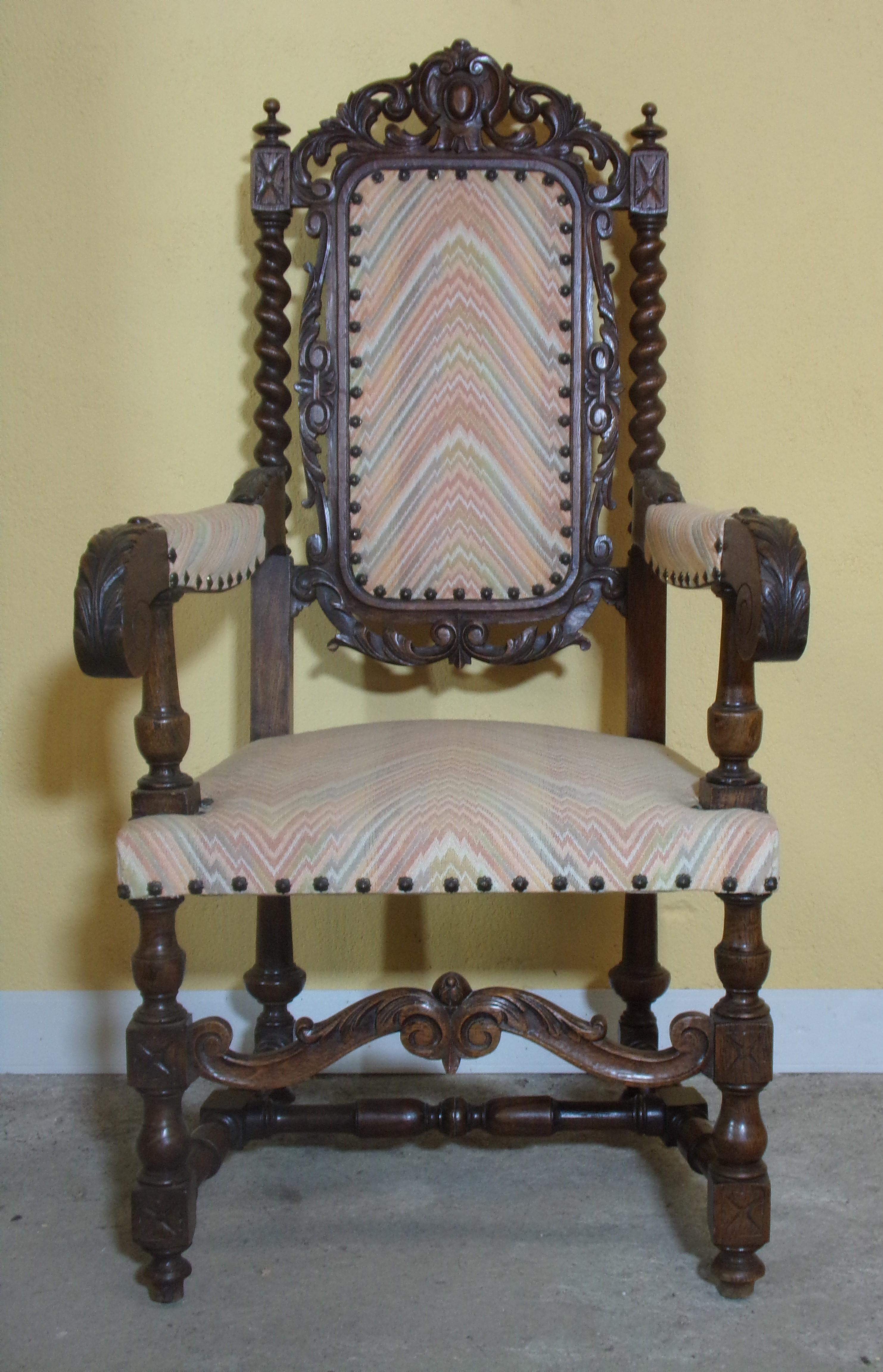 A good pair of solid carved oak Renaissance Revival Throne arm chairs C1880 beautifully hand carved and in excellent condition both frames and upholstery.