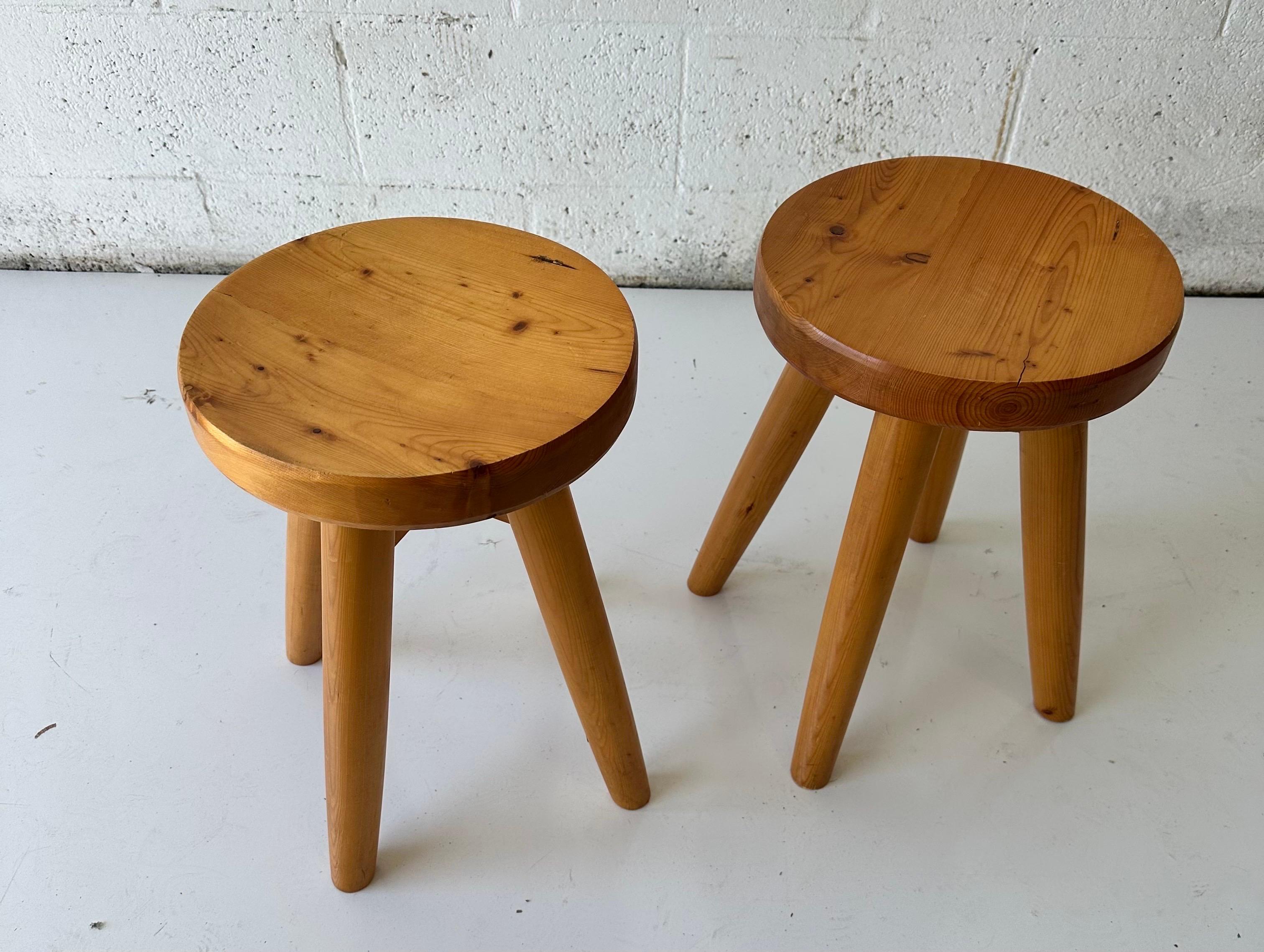 Pair of pine Stools made by Rene Martin Alias “ Rene Les ciseaux “.
He was the Charlotte Perriand Ebenist for “ Les  Arcs “ the French Alps ski resort.
Provenance: residence Les Dryades.