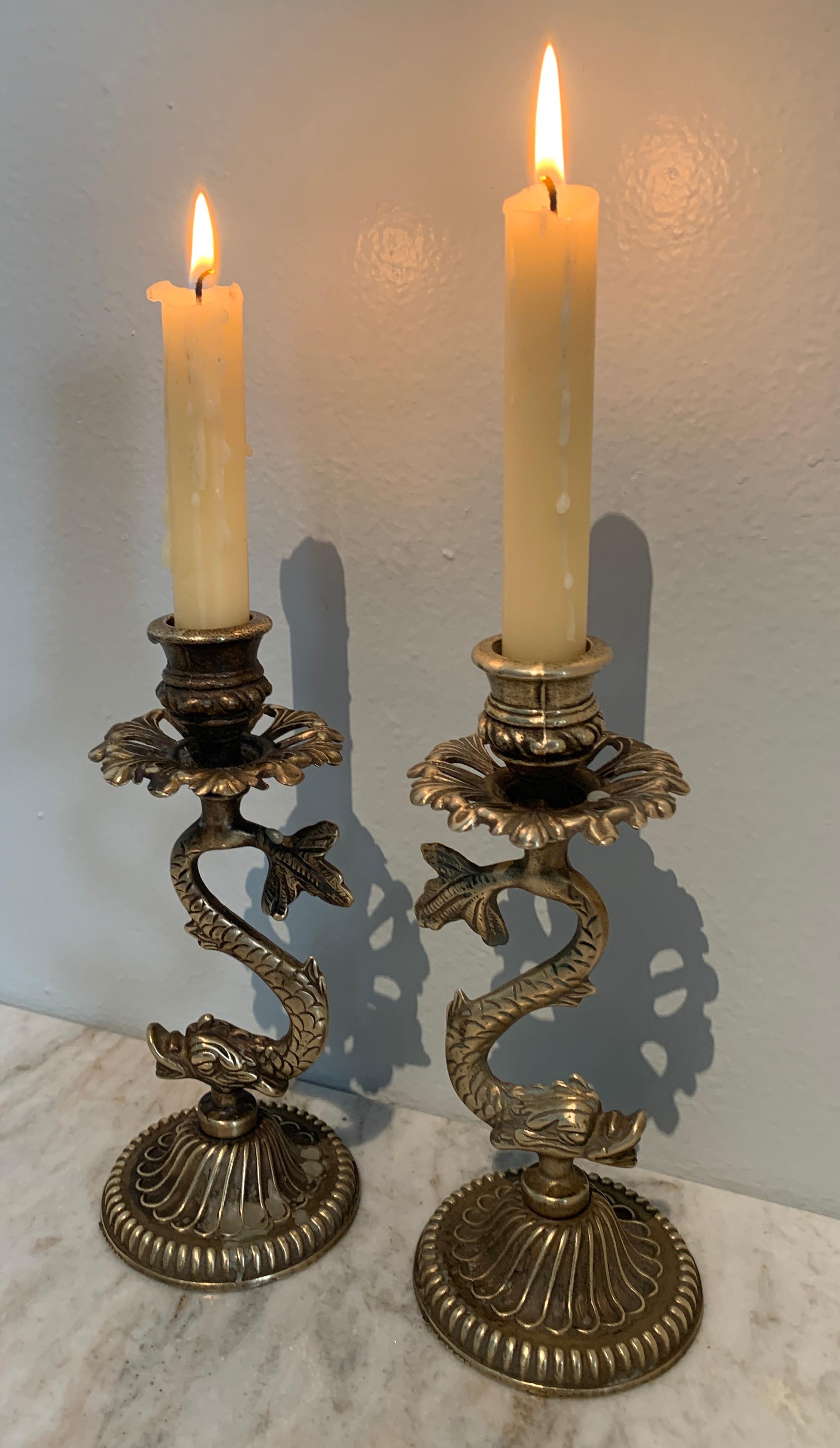 Pair of Repoussé Brass Dolphin Candlesticks In Good Condition For Sale In Los Angeles, CA