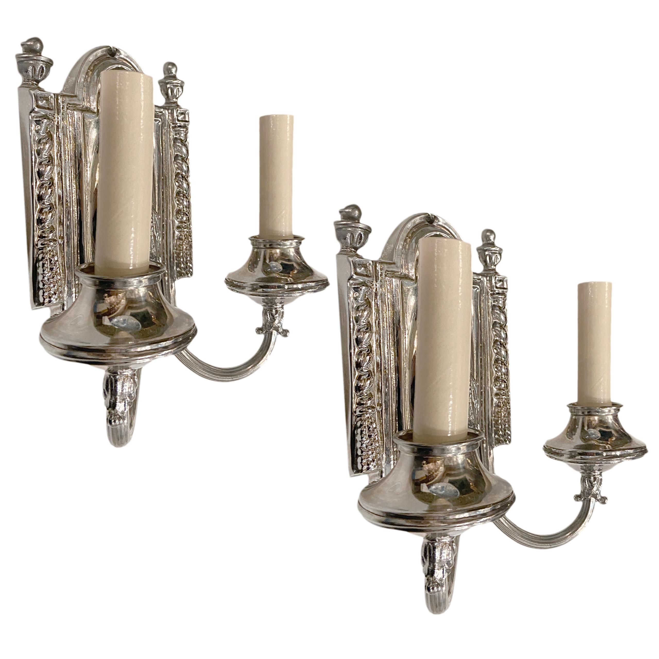 A pair of circa 1930's Italian repousse' metal sconces. 

Measurements:
Height: 8