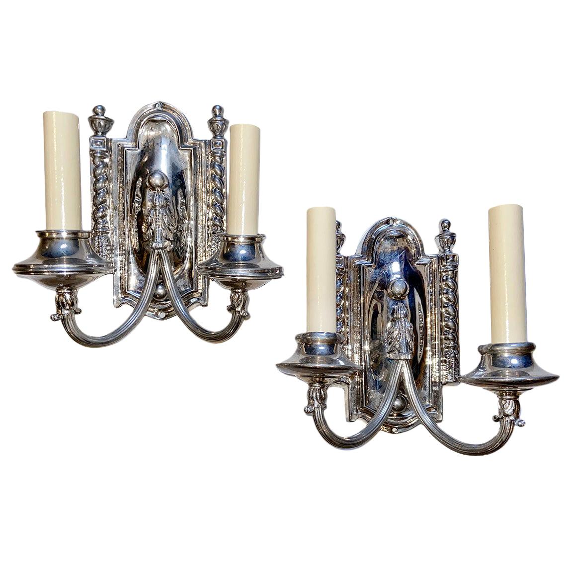 Pair of Repousse Metal Sconces For Sale