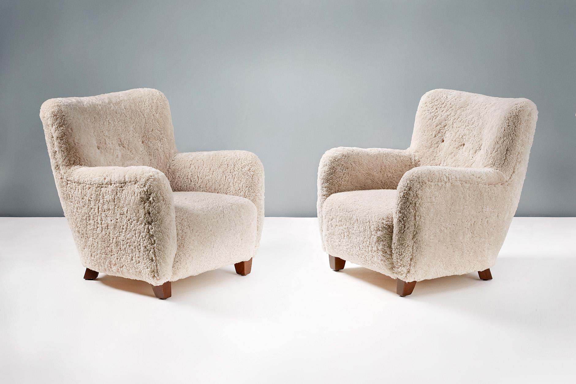 Pair of Reproduction 1950s Sheepskin Armchairs and Ottomans 1