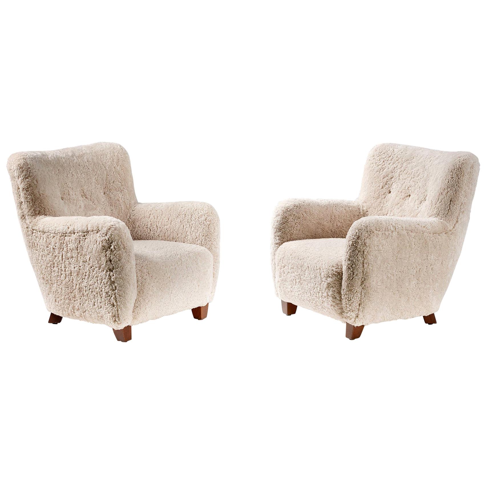 Pair of Reproduction 1950s Sheepskin Armchairs and Ottomans