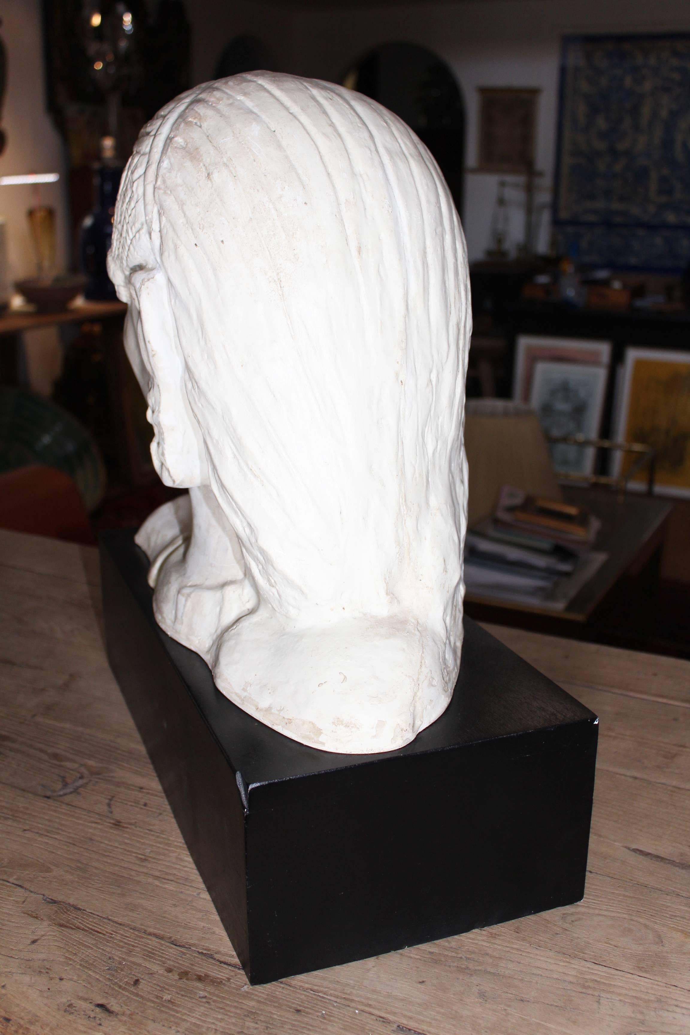 Pair of Resin African Busts with Plaster Finish on a Black Wooden Pedestal 1