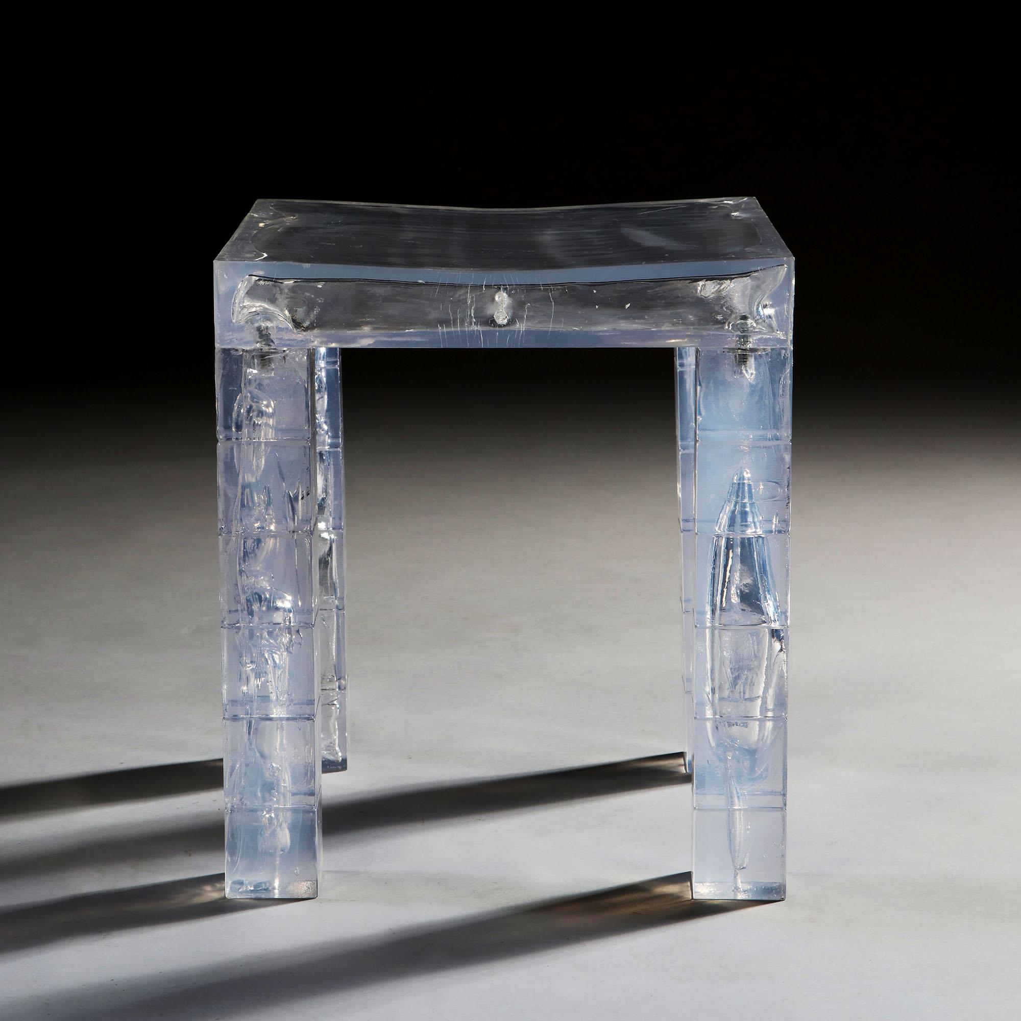 A pair of clear resin occasional tables simulated to imitate ice cubes. Stamped to the underside: STURM UND PLASTIC.