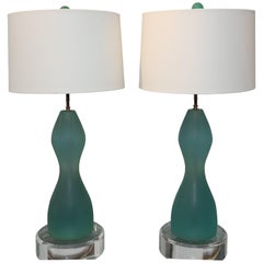 Pair of Resin Lampos with Cear Lucite Bases