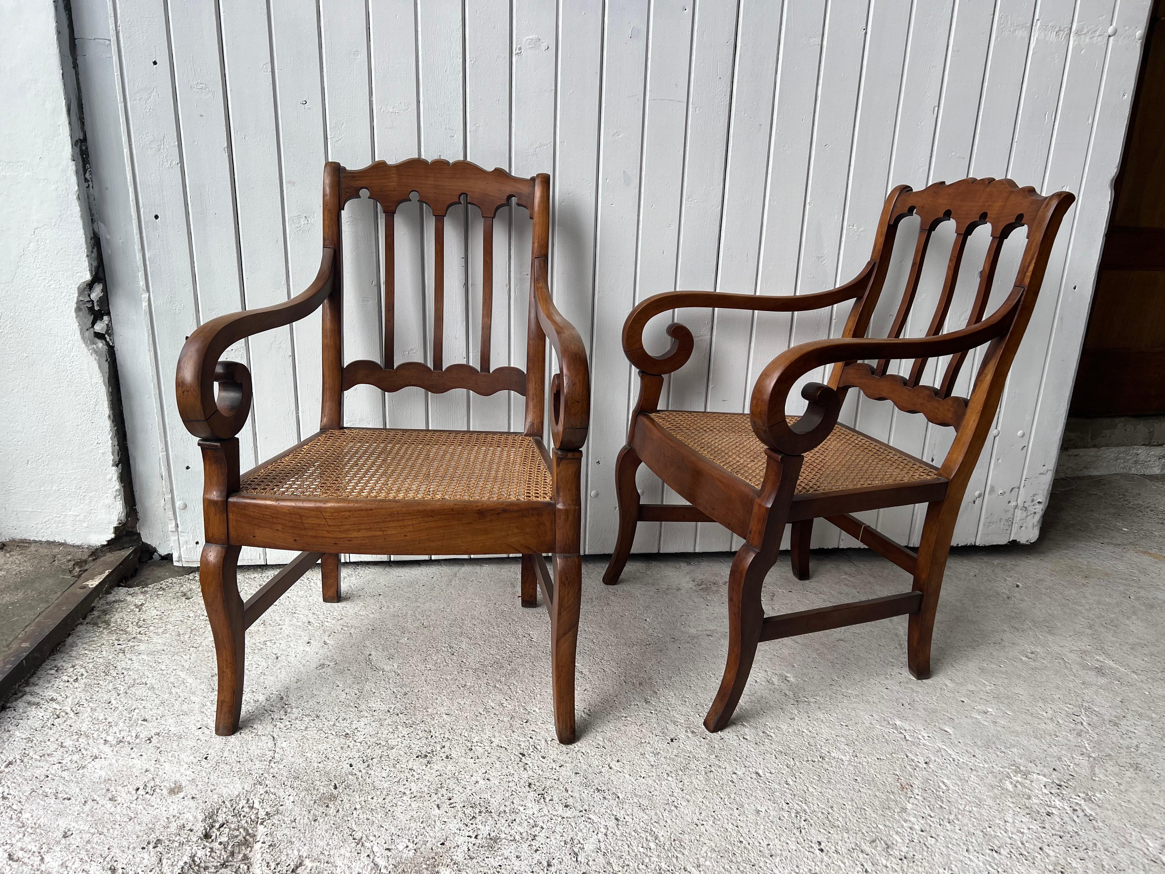 Pair of restauration armchairs , in walnut and one new original cane 
That’s a real original Provencal model 
