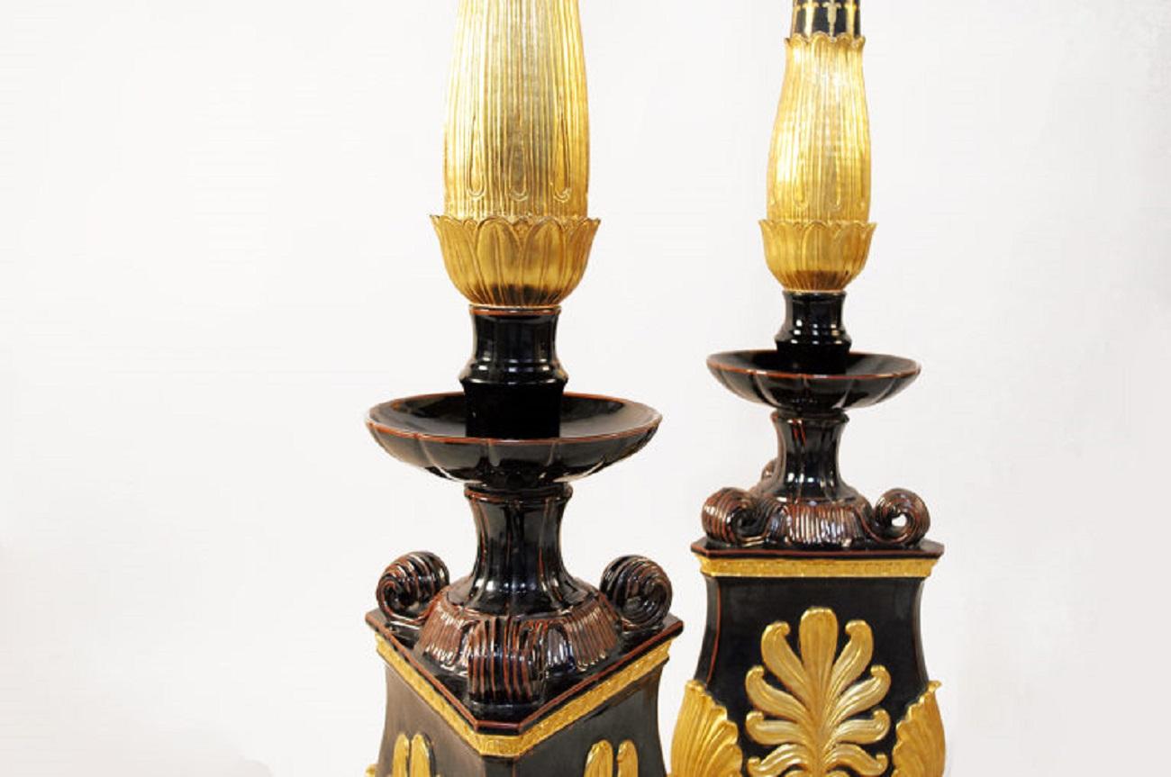 20th Century Pair of Restauration Style Torchieres in Black and Gilt Earthenware, circa 1950 For Sale