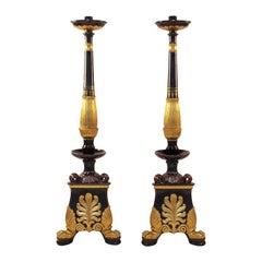 Pair of Restauration Style Torchieres in Black and Gilt Earthenware, circa 1950