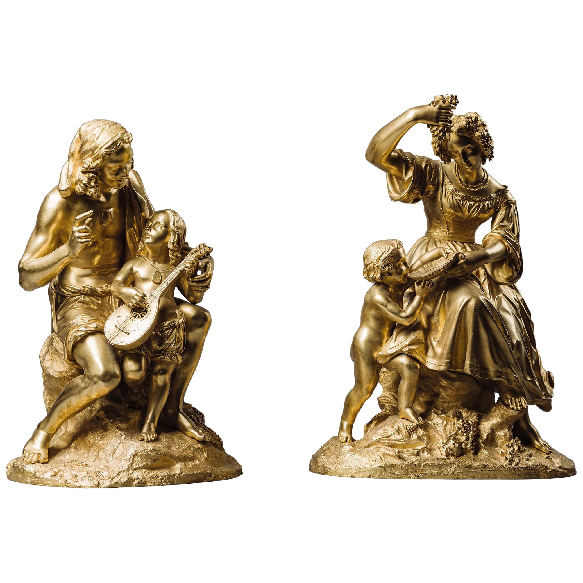 Paar allegorische Gruppen aus vergoldeter Bronze aus der Zeit der Restauration. Französisch:: um 1830