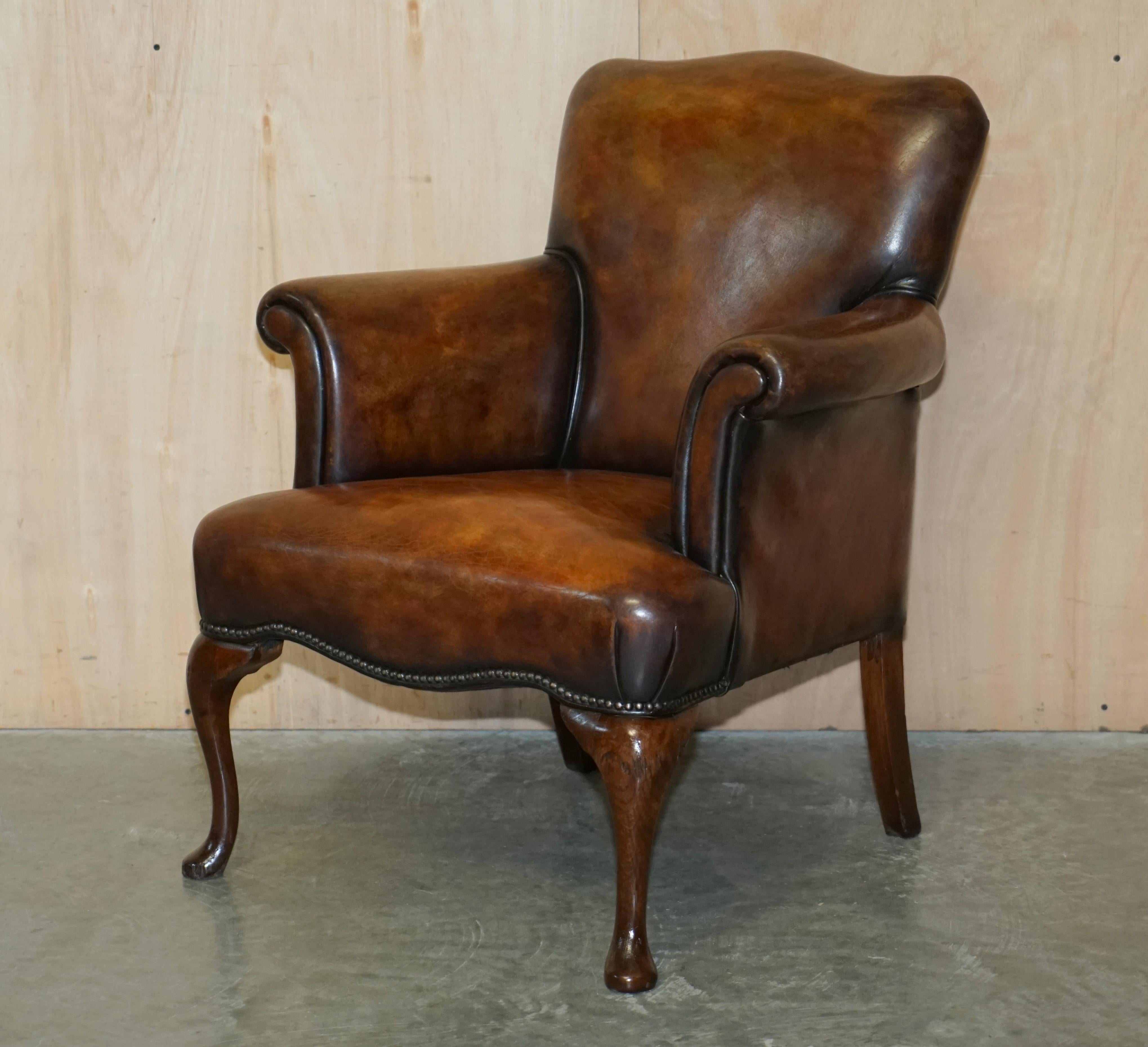 We are delighted to offer for sale this very well made pair of Antique Art Deco club armchairs, hand dyed this one of a kind cigar brown colour with solid English oak cabriolet legs

This is one of the most impressive pairs of armchairs I have