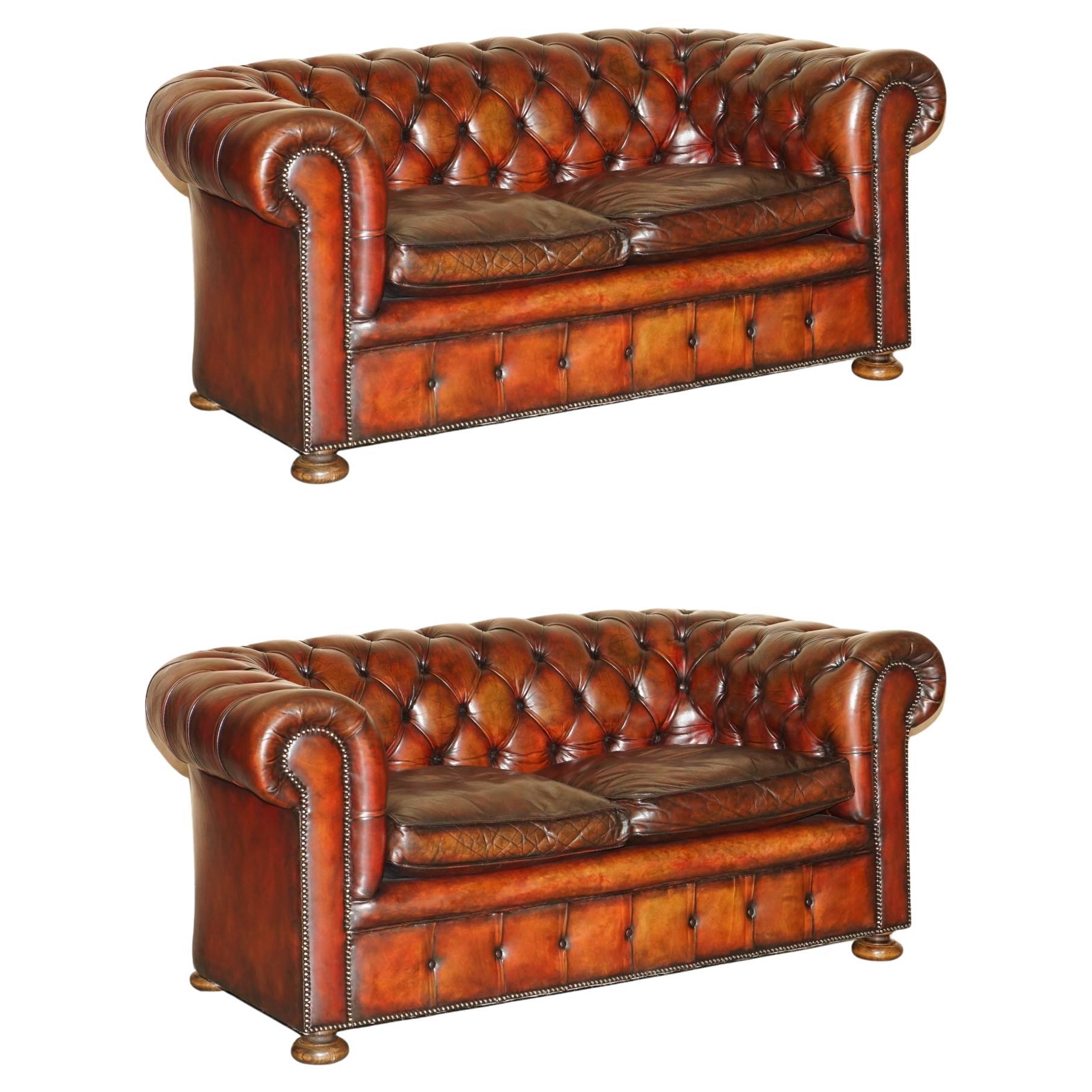 Pair of Restored Antique Gentleman's Tufted Chesterfield Brown Leather Sofas For Sale