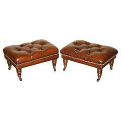 Vintage PAIR OF RESTORED BROWN LEATHER CHESTERFIELD TUFTED PORCELAIN CASTORS FOOTSTOOLs