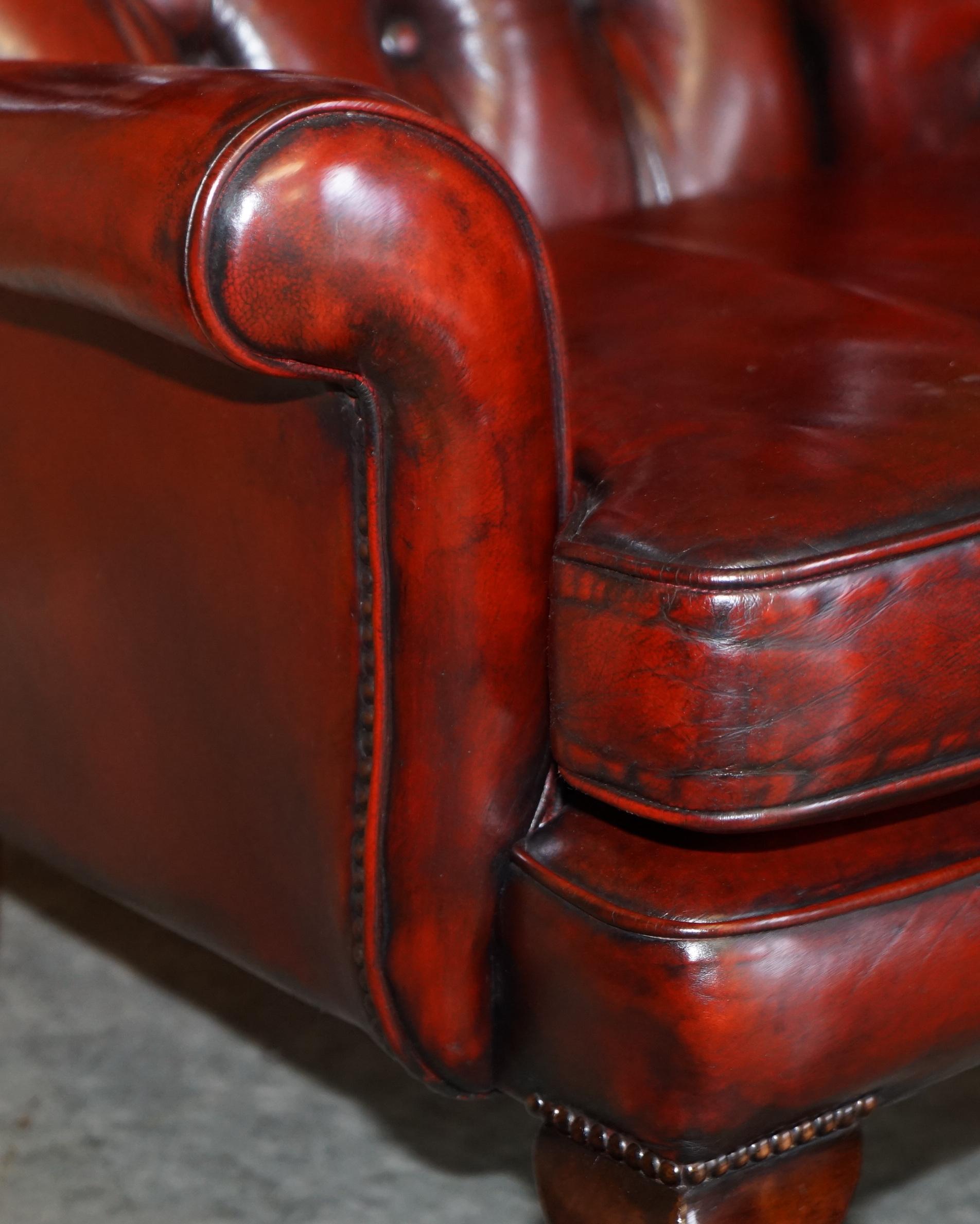 Pair of Restored Chesterfield Wingback Bordeaux Leather Armchairs & Footstools 5