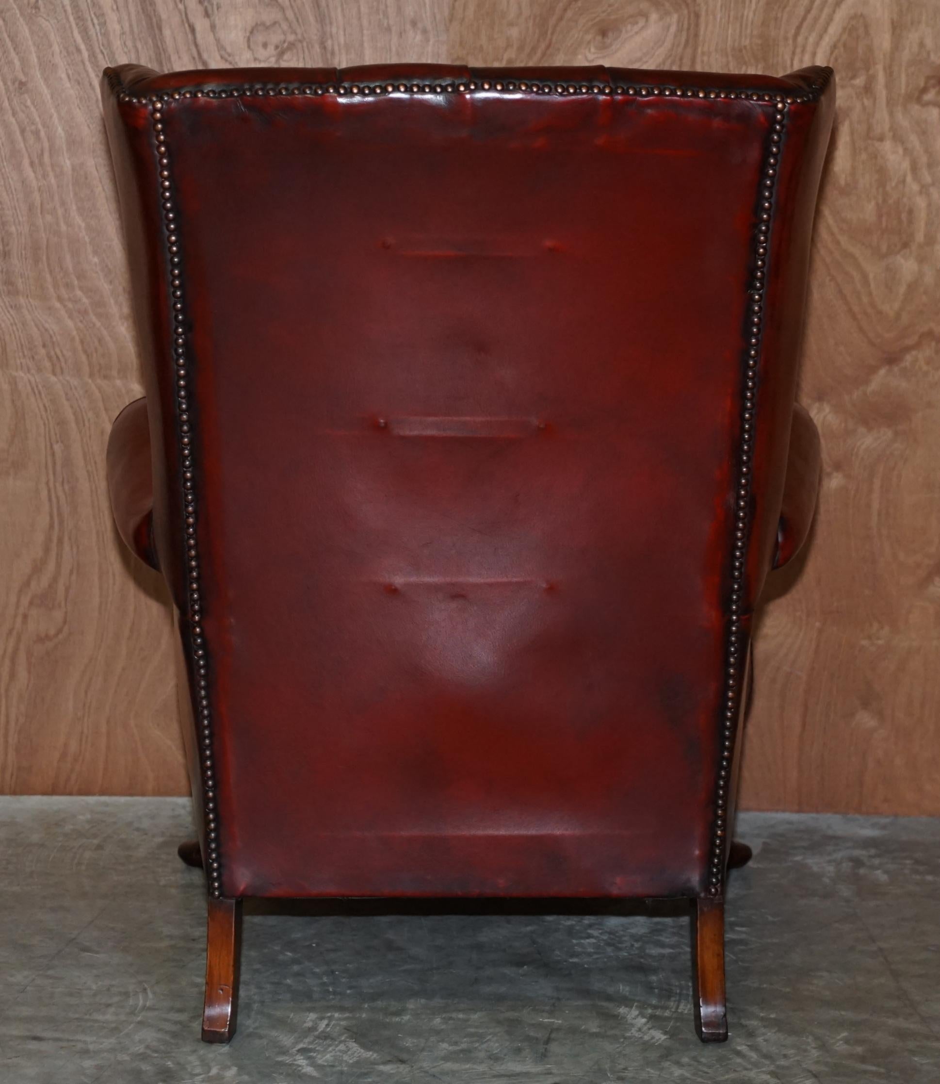 Pair of Restored Chesterfield Wingback Bordeaux Leather Armchairs & Footstools 8
