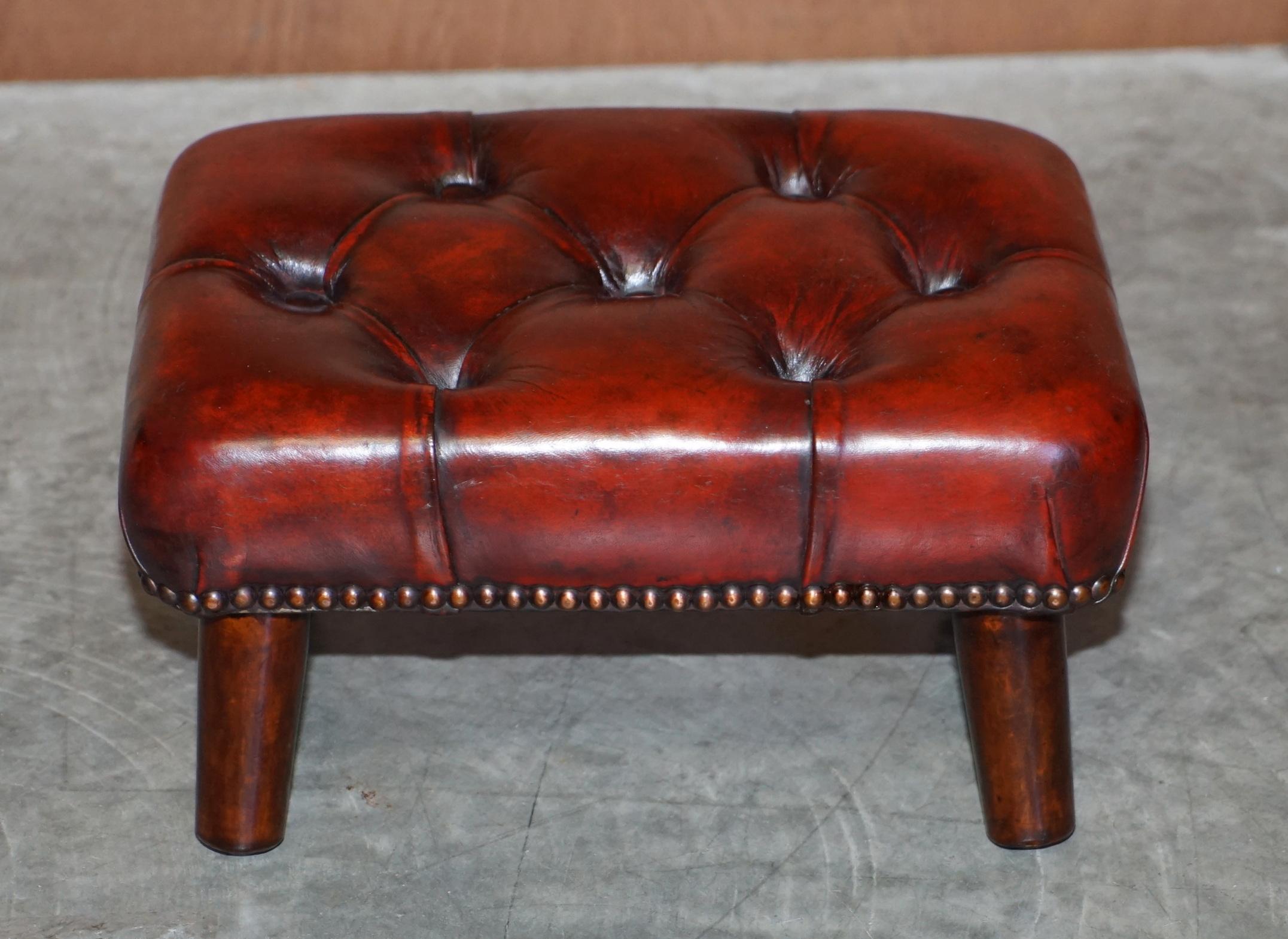 Pair of Restored Chesterfield Wingback Bordeaux Leather Armchairs & Footstools 11
