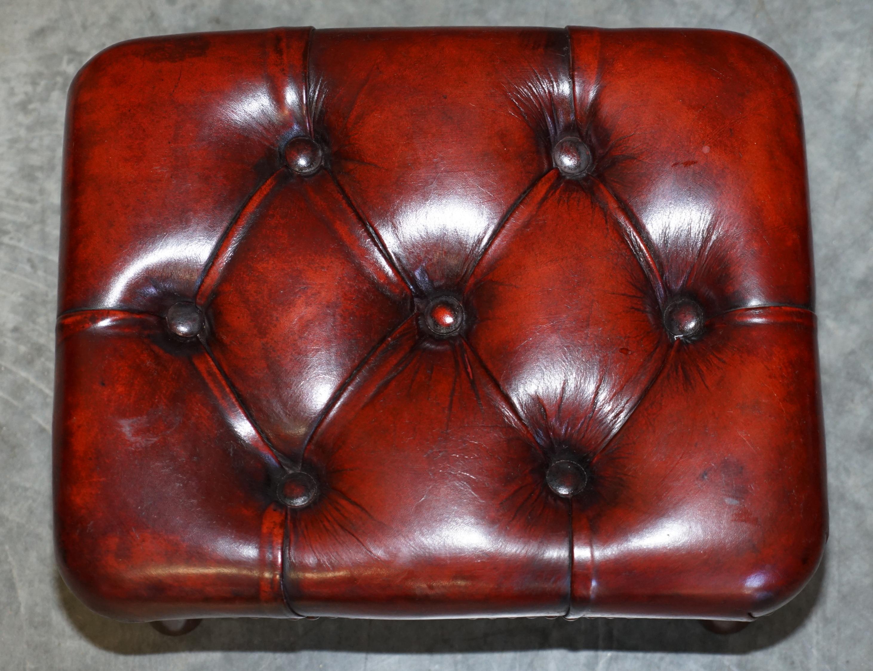 Pair of Restored Chesterfield Wingback Bordeaux Leather Armchairs & Footstools 12