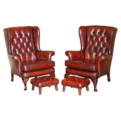 Vintage Pair of Restored Chesterfield Wingback Bordeaux Leather Armchairs & Footstools