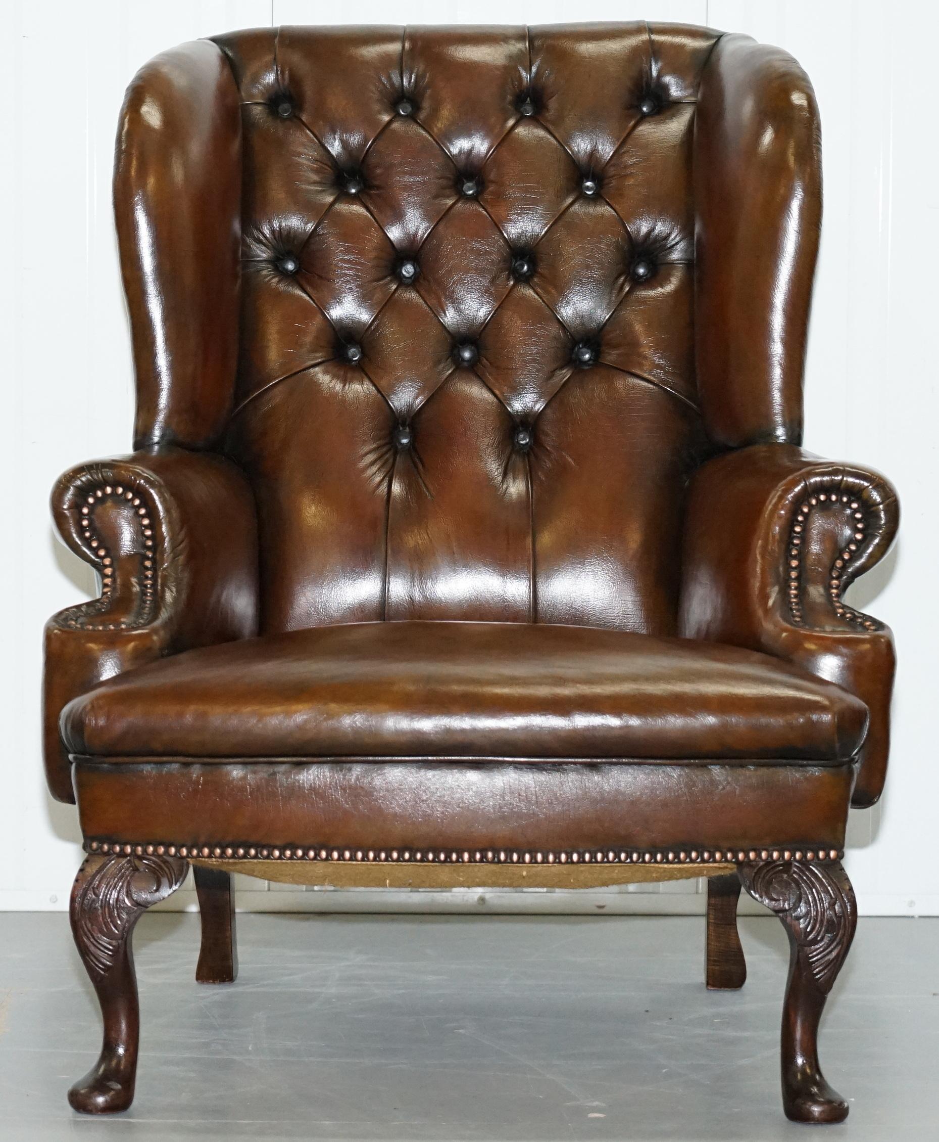 We are delighted to offer for sale this stunning pair of fully restored cigar brown leather Chesterfield wingback armchairs with hand-carved Acanthus leaf cabriolet legs 

Please note the delivery fee listed is just a guide, it covers within the