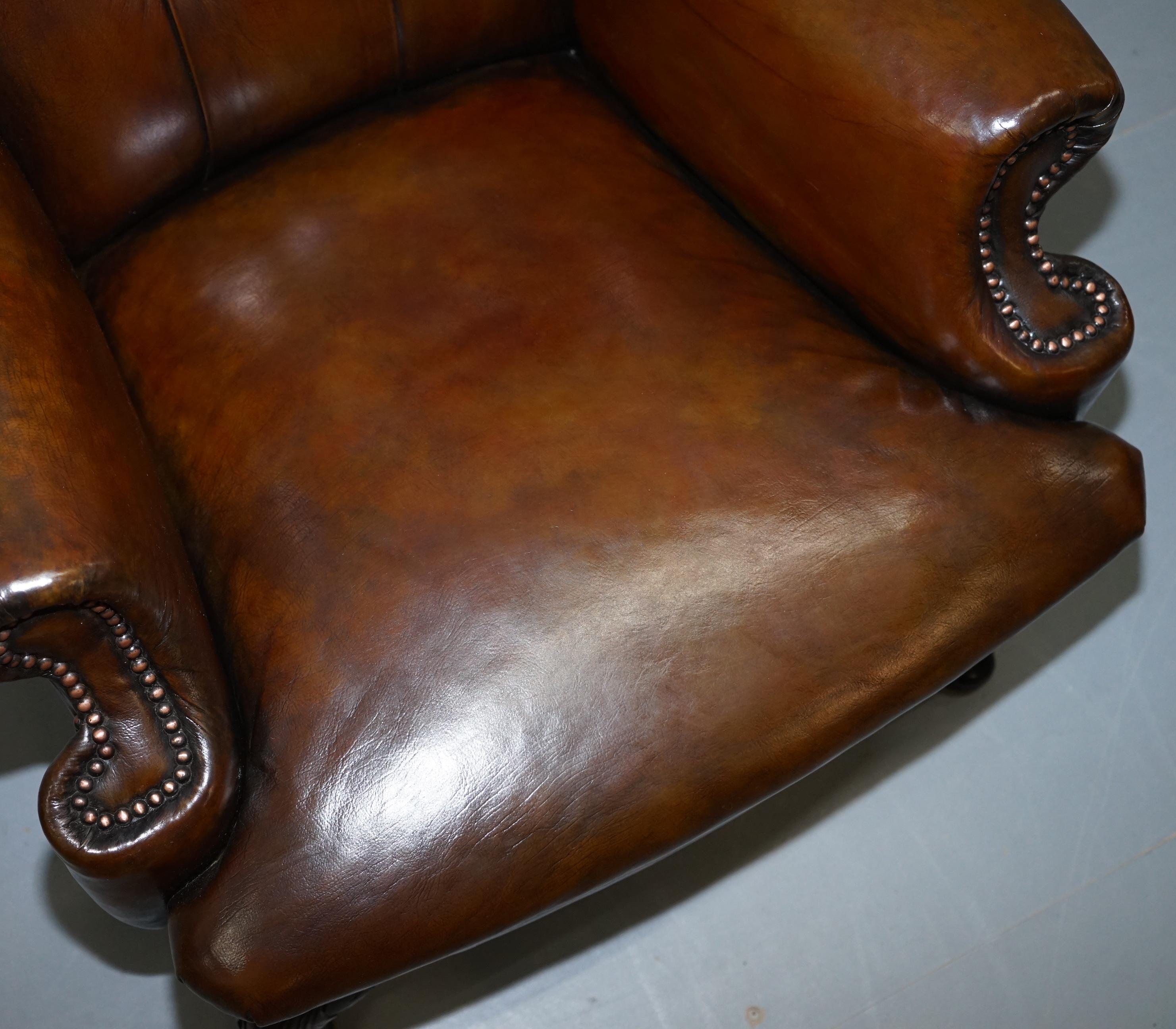 20th Century Pair of Restored Cigar Brown Leather Chesterfield Wingback Armchairs Carved Legs