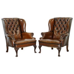 Vintage Pair of Restored Cigar Brown Leather Chesterfield Wingback Armchairs Carved Legs