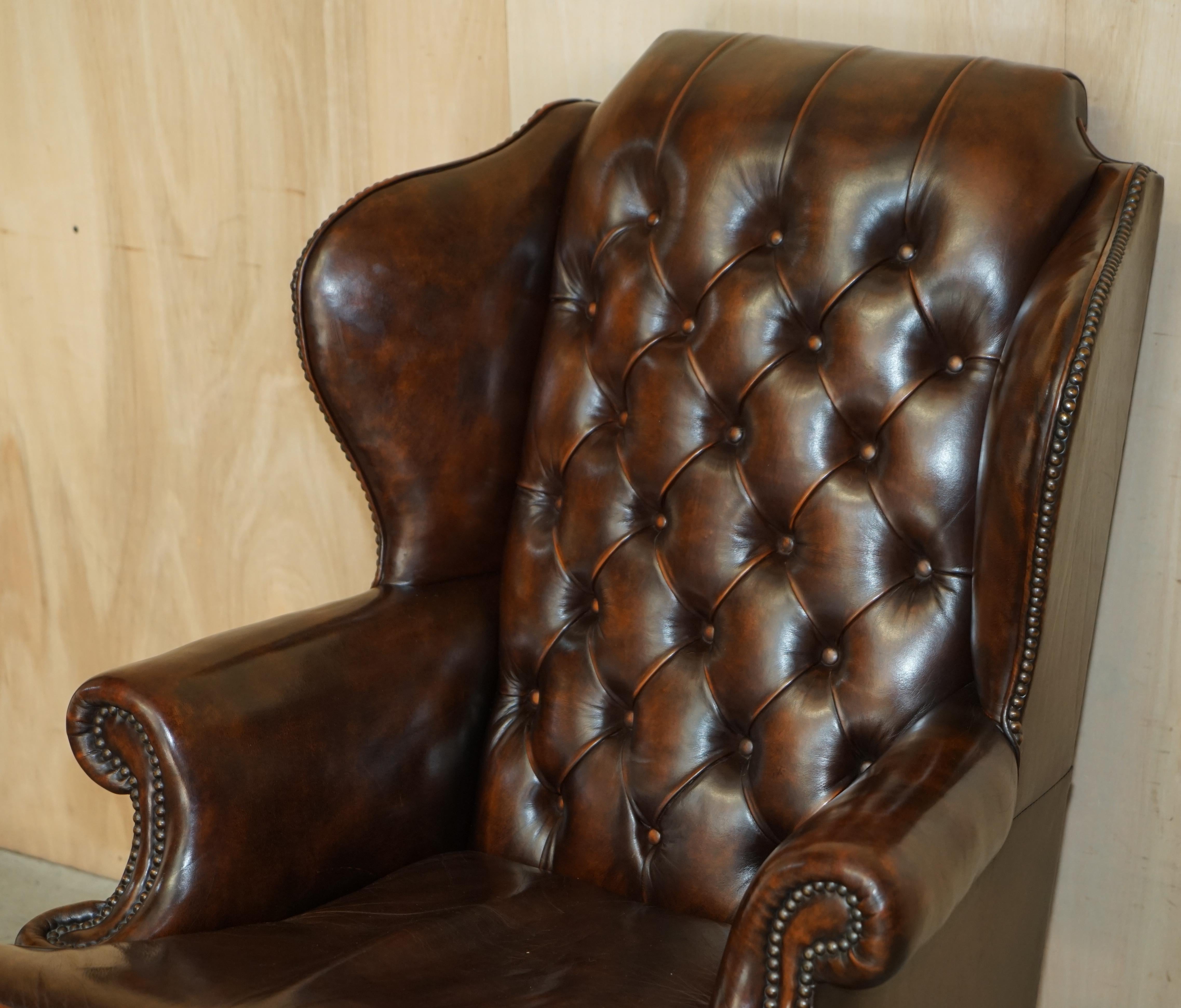 English Pair of Restored Claw & Ball Chesterfield Wingback Brown Leather Armchairs
