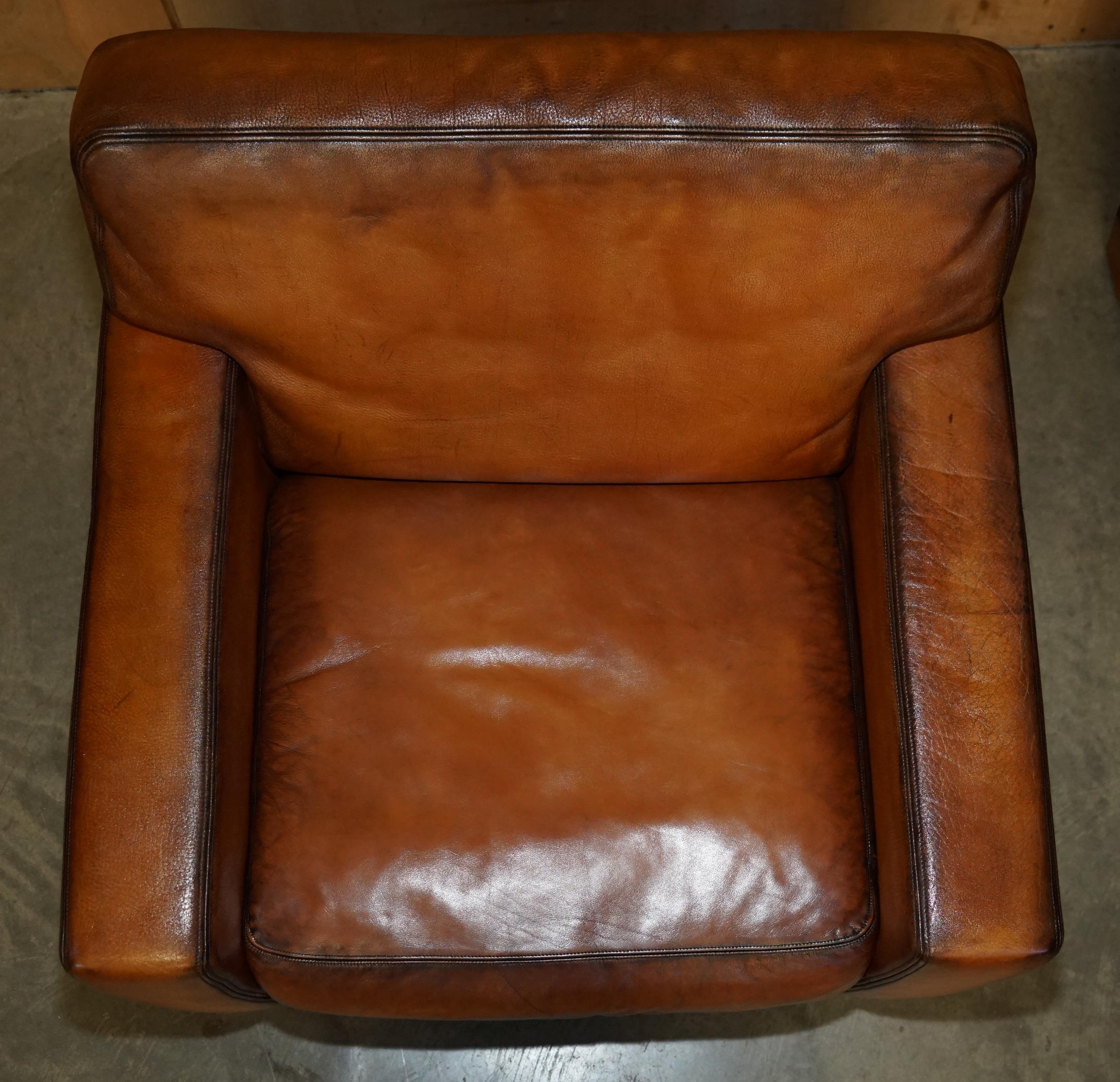 PAIR OF RESTORED DE SEDE DS17 BROWN BUFFALO NECK LEATHER ARMCHAIRS & FOOTSTOOLs (Ende des 20. Jahrhunderts) im Angebot