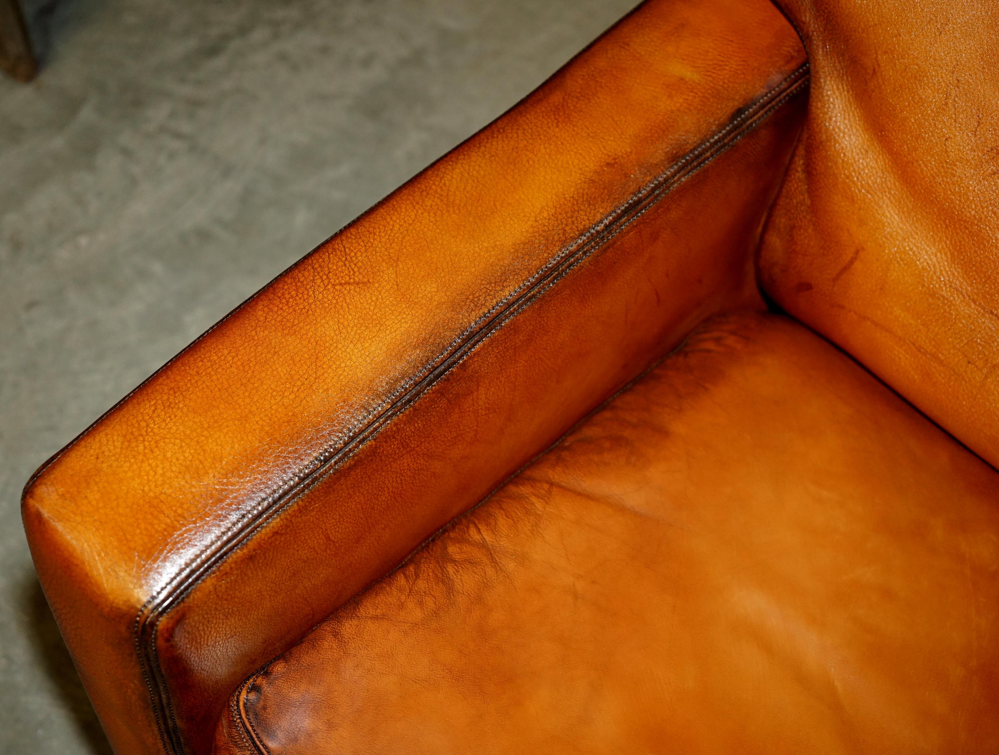 PAIR OF RESTORED DE SEDE DS17 BROWN BUFFALO NECK LEATHER ARMCHAIRS & FOOTSTOOLs (Leder) im Angebot