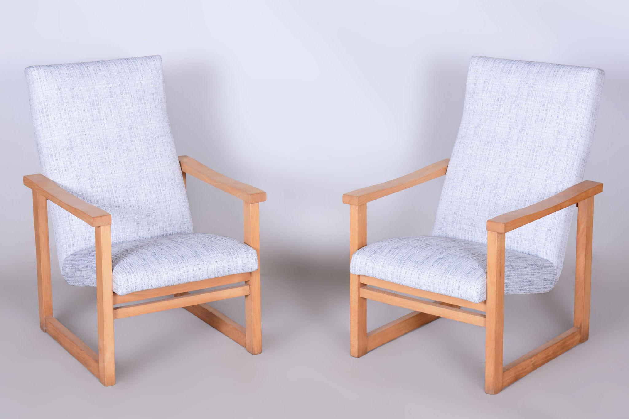 Pair of Original Mid-Century Beech Armchairs.

According to the original process, our professional refurbishing team in Czechia has restored and reupholstered the item. 

The surface of the wood is wrinkled by brushing for greater